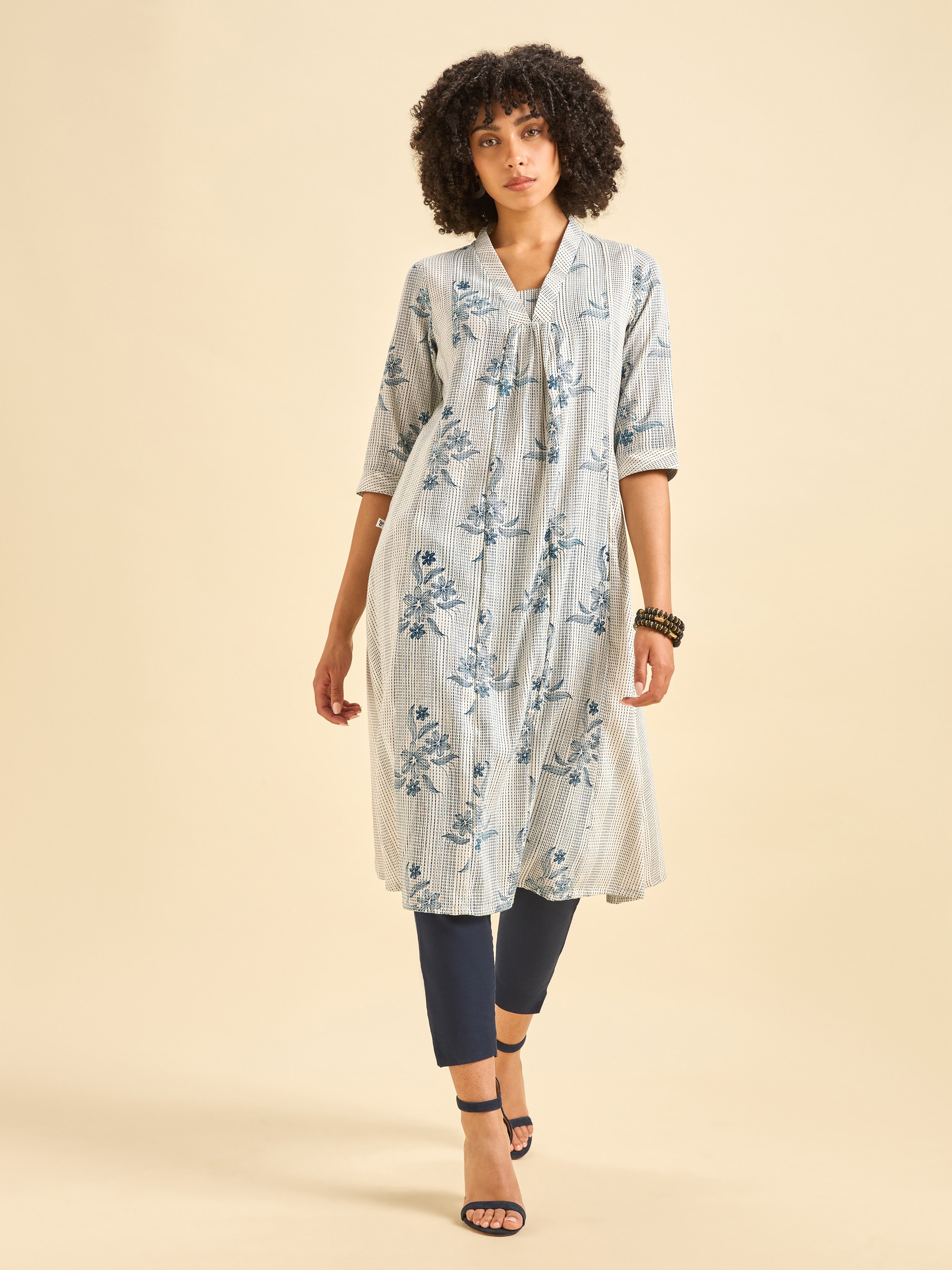 White And Navy Blue Cotton Blend Foil Print Flared Kurti With Panel Cut