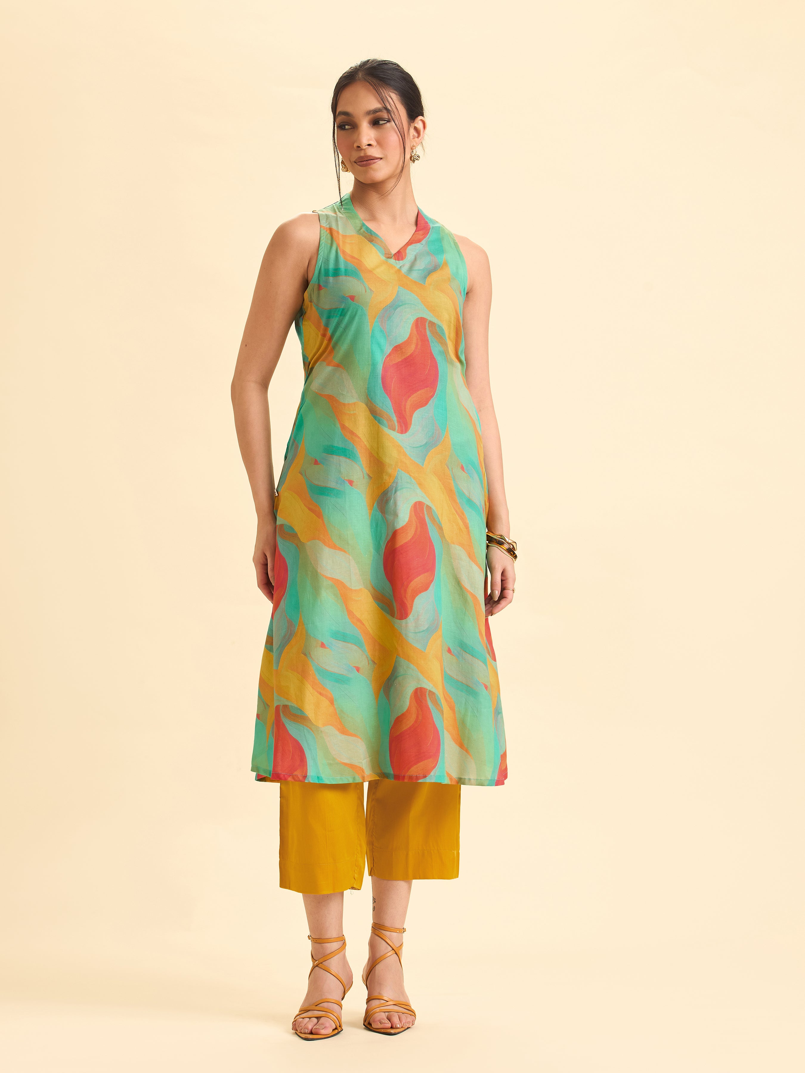 Women Wearing Ivory And Blue Cotton Flax Printed Kurti With Embroidery