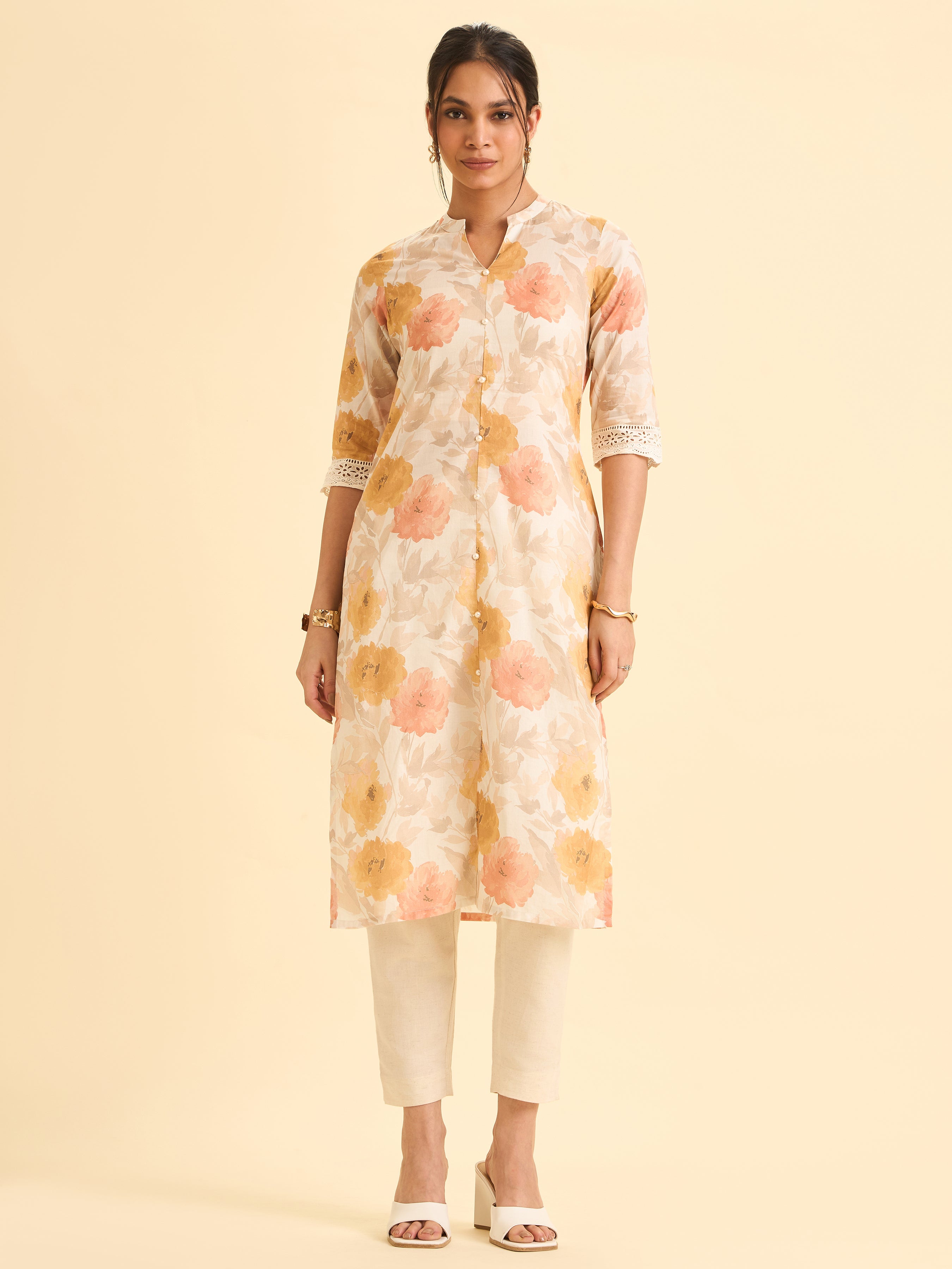 Ivory And Mustard Yellow Pure Cotton Printed Slited Kurti With Lace