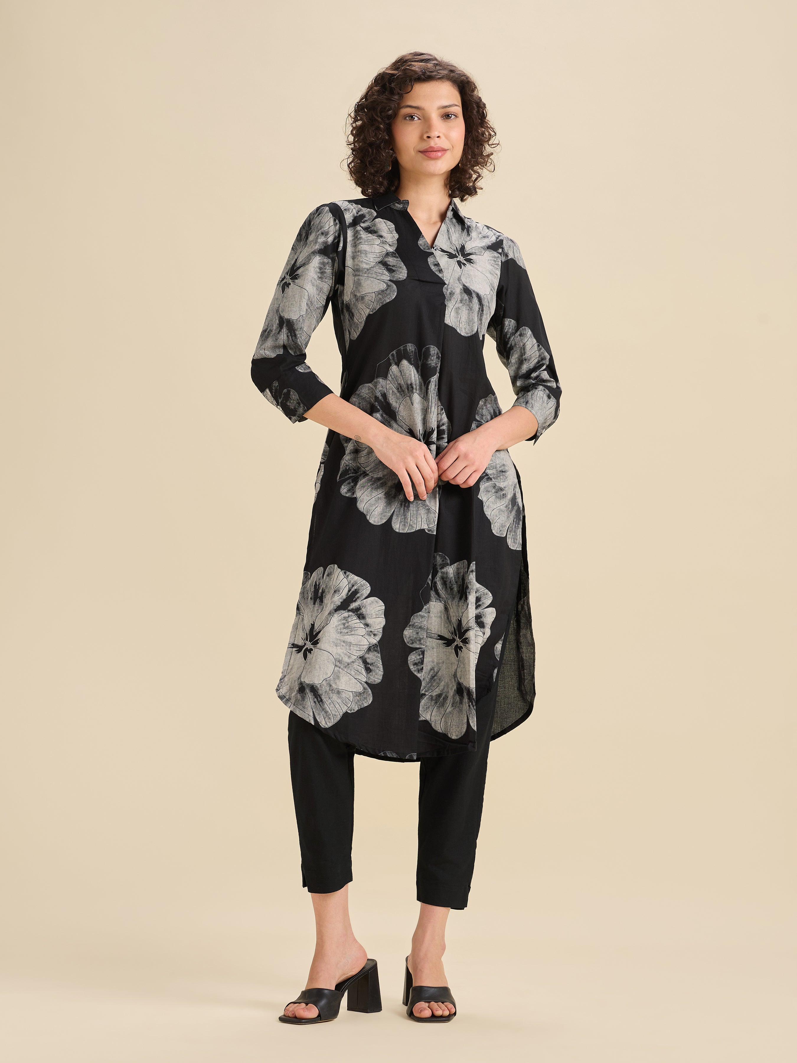Black And White Pure Cotton Printed Slited Kurti With Knife Pleats And Curved Hem Line
