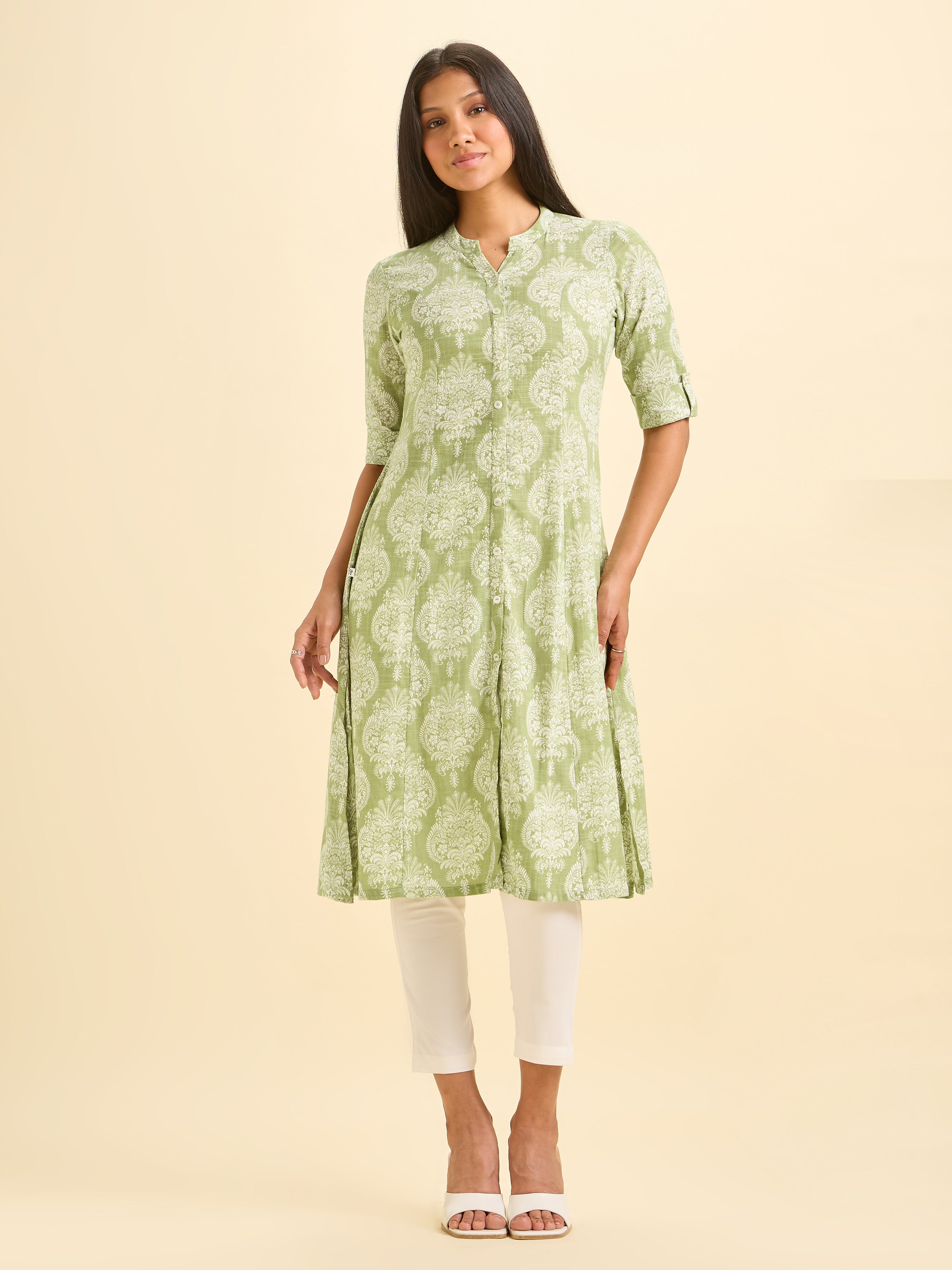 Pista Green And White Cotton Slub Printed Flared Kurti With Princess Cut
