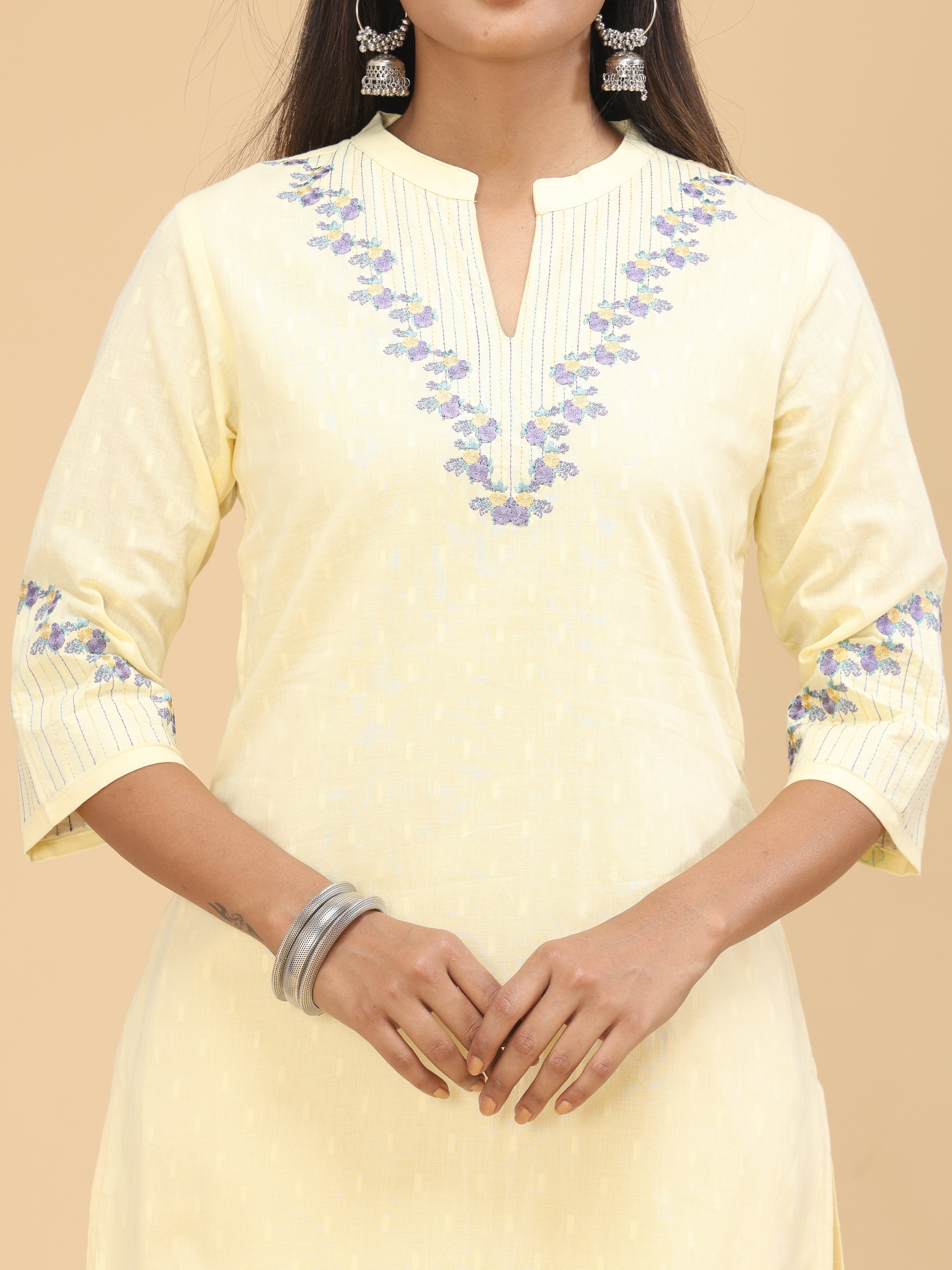 Pale Yellow Cotton Plain Kurti With Embroidery