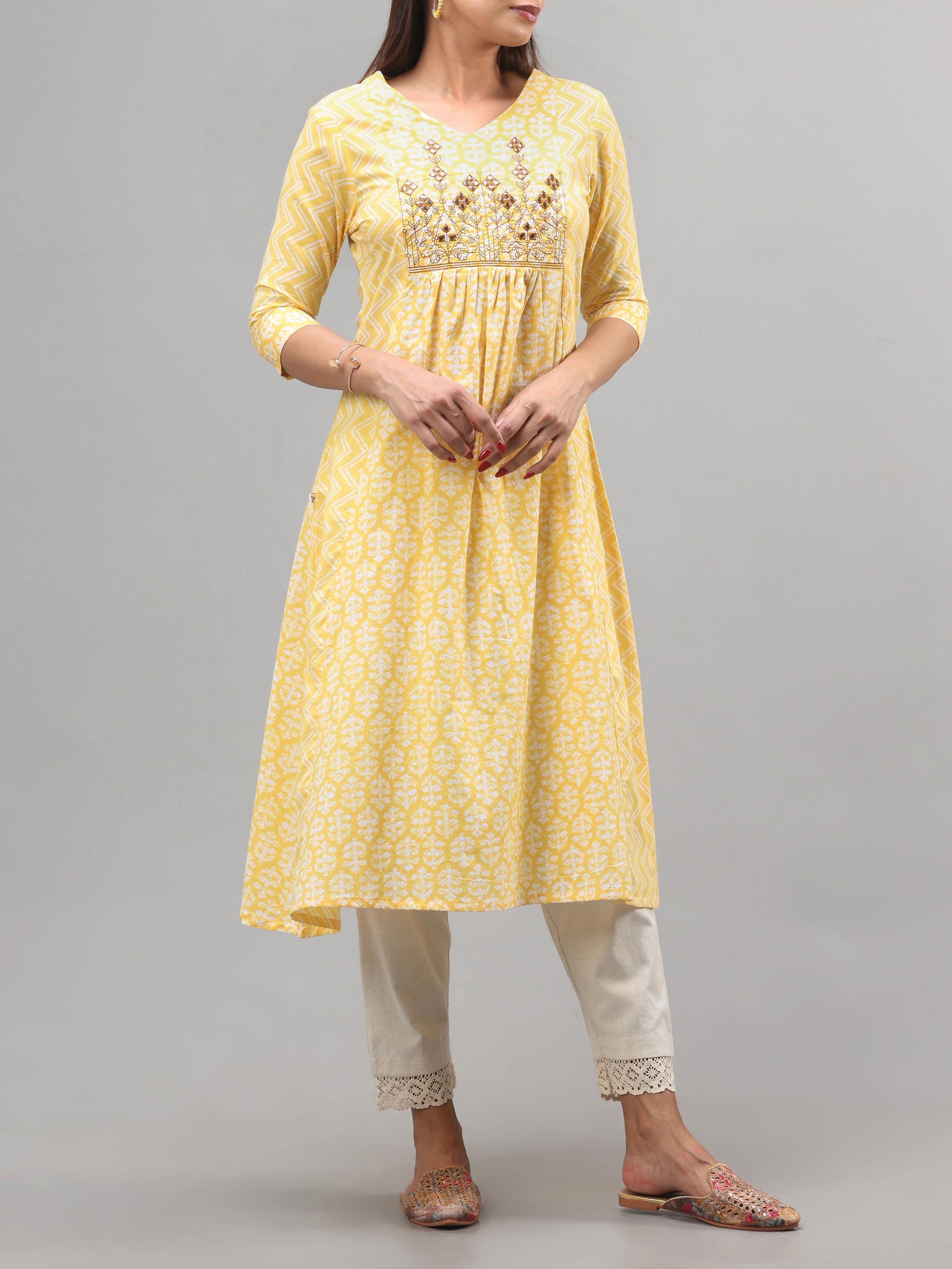 Yellow Pure Cotton Printed Kurti With Embroidery