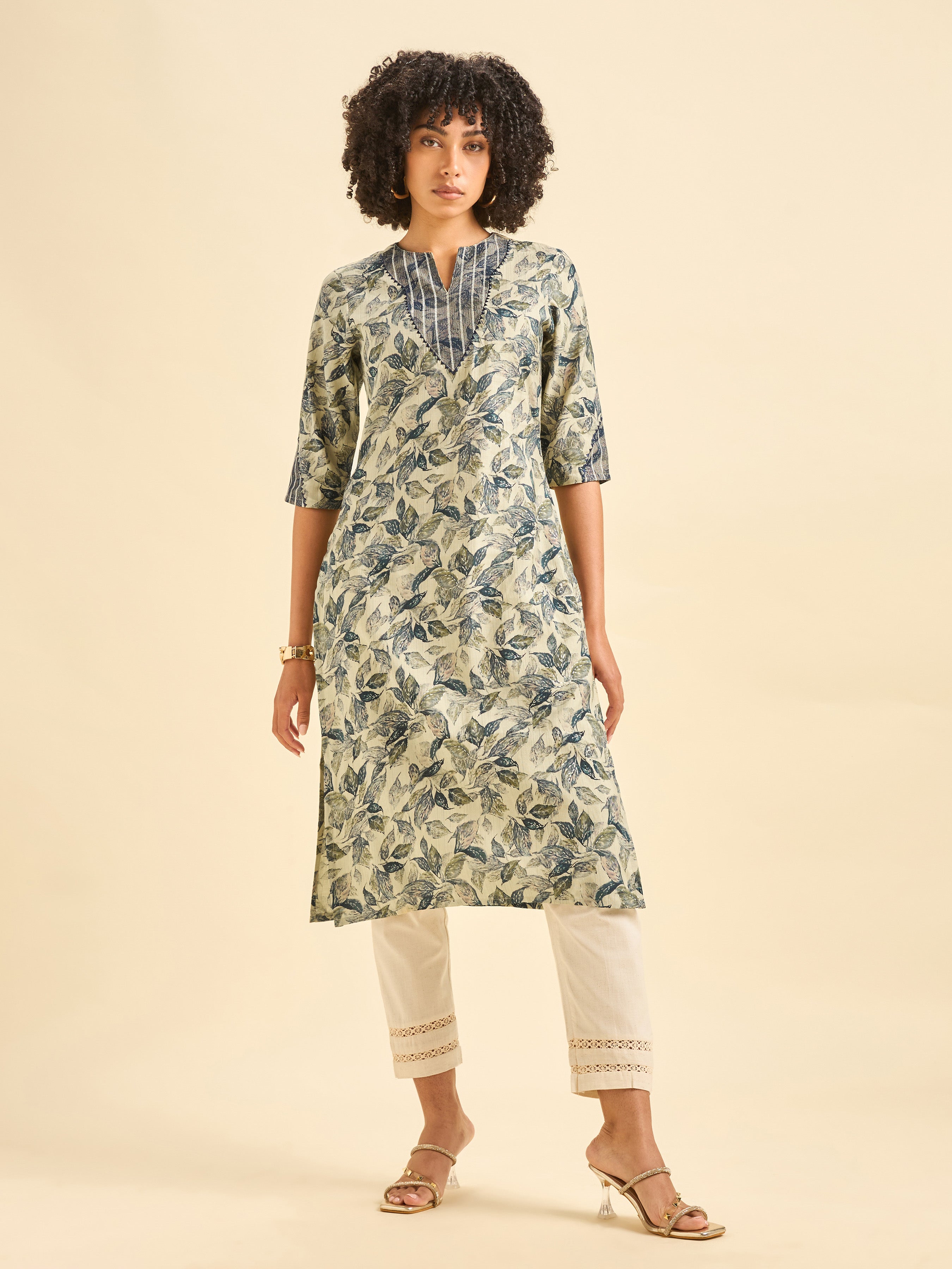 Ivory And Blue Viscose Blend Foil Printed Kurti With Embroidery