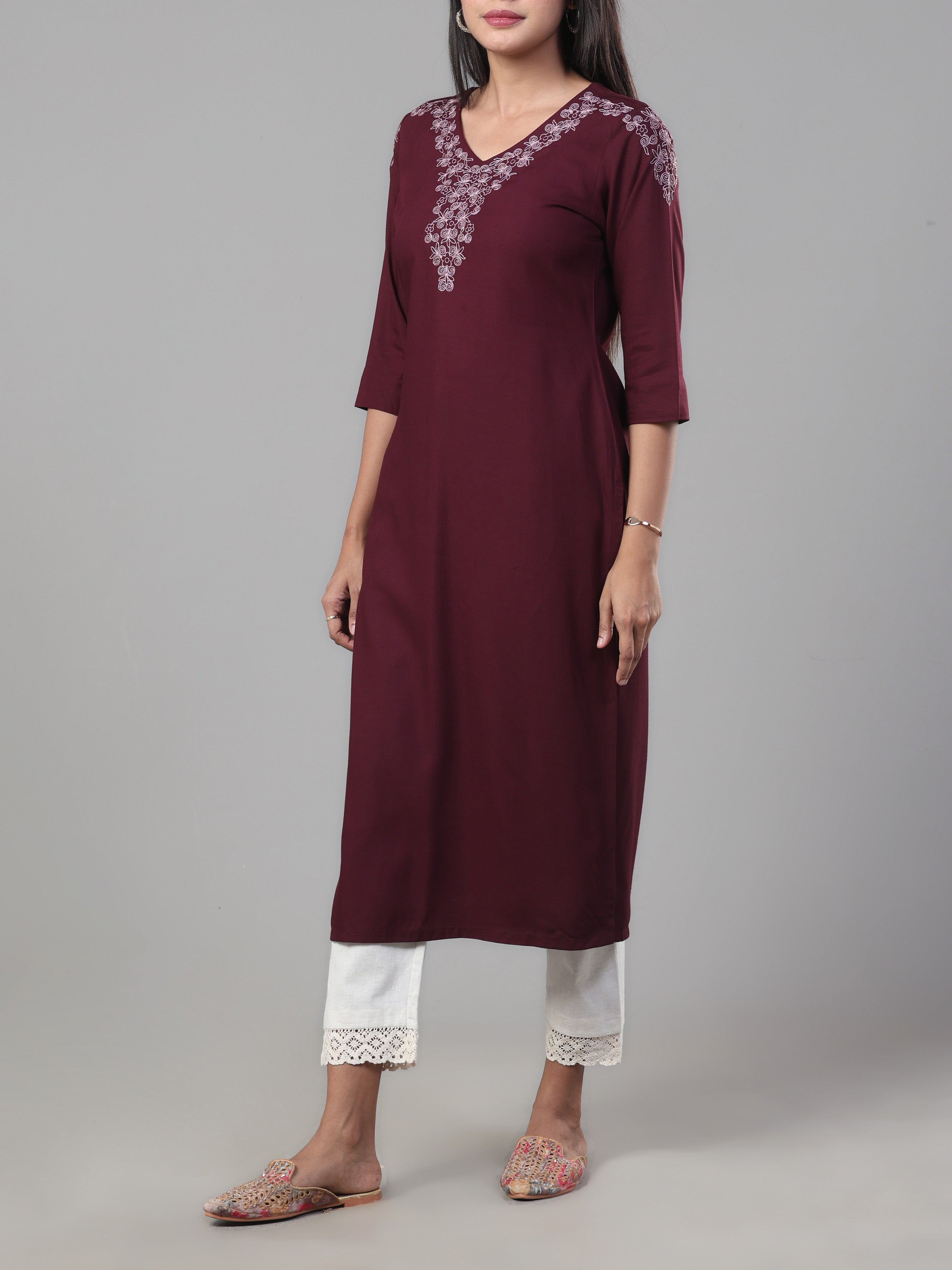 Women Wearing Wine Red Viscose Slub Kurti With Embroidery