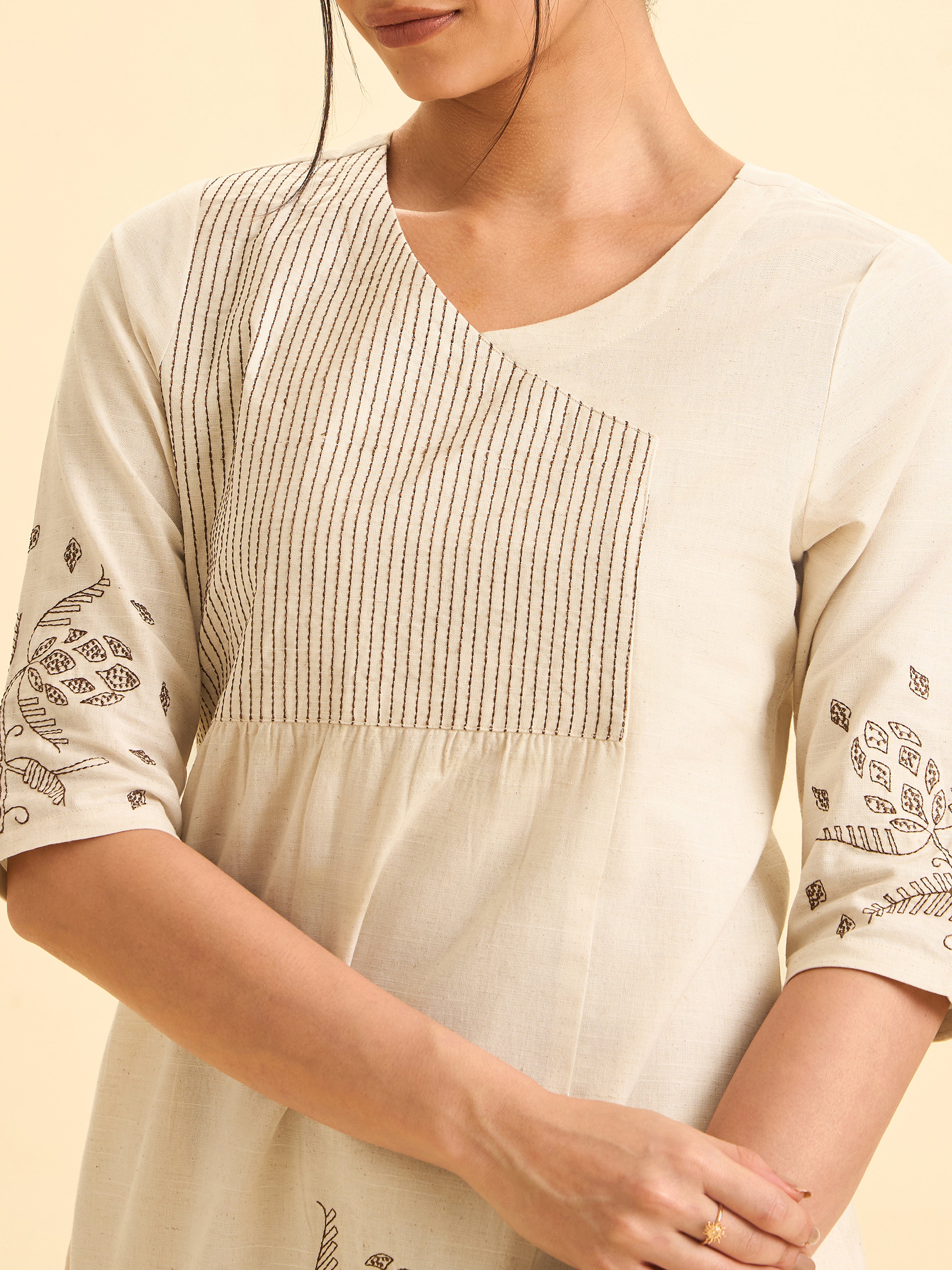Ivory Cotton Flax Slub Embroideriy Kurti With Panelcut And Gathers