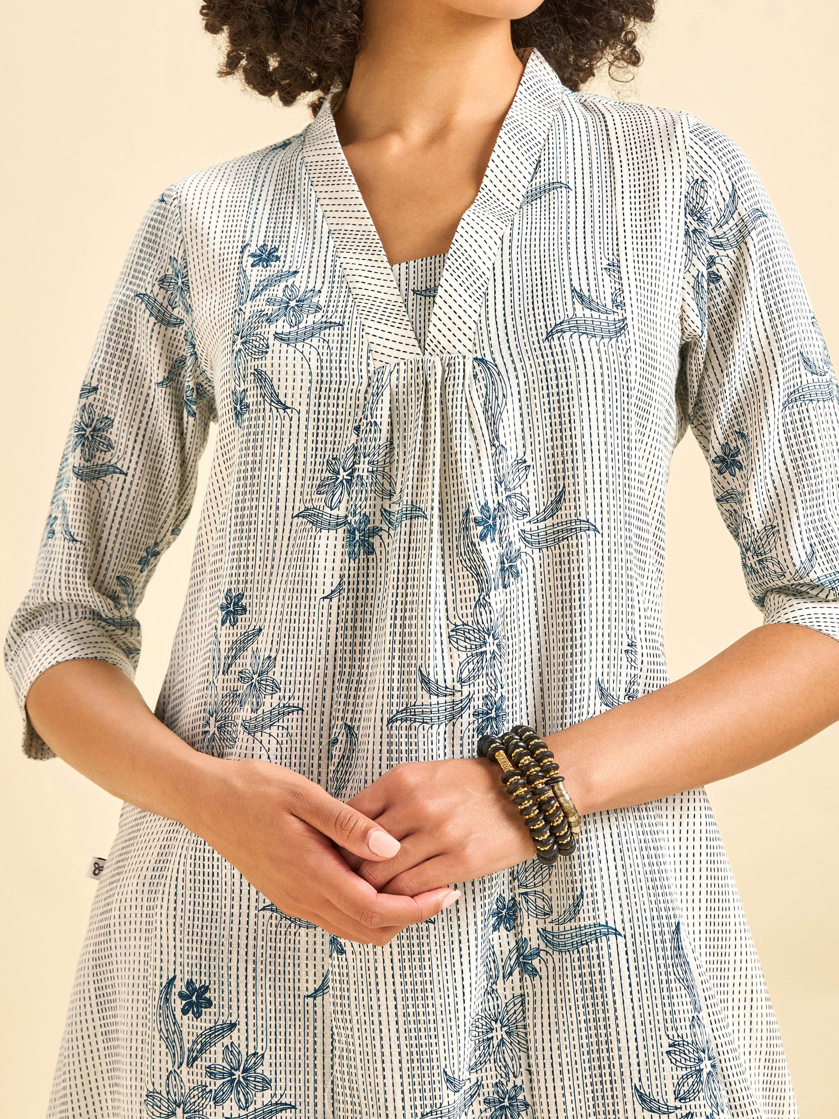 White And Navy Blue Cotton Blend Foil Print Flared Kurti With Panel Cut