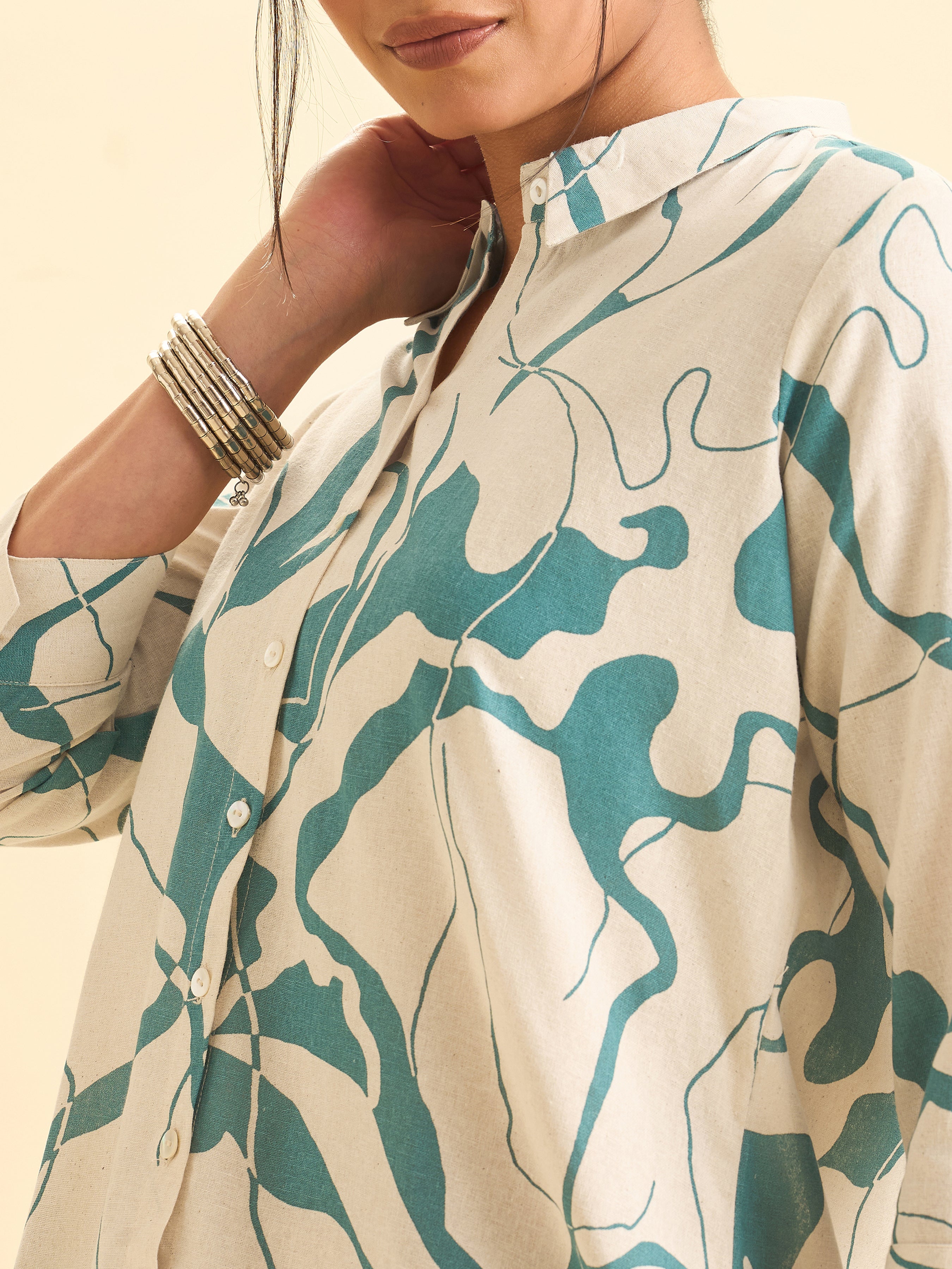 Ivory And Teal Cotton Flax Printed Flared Kurti With Curved Hem