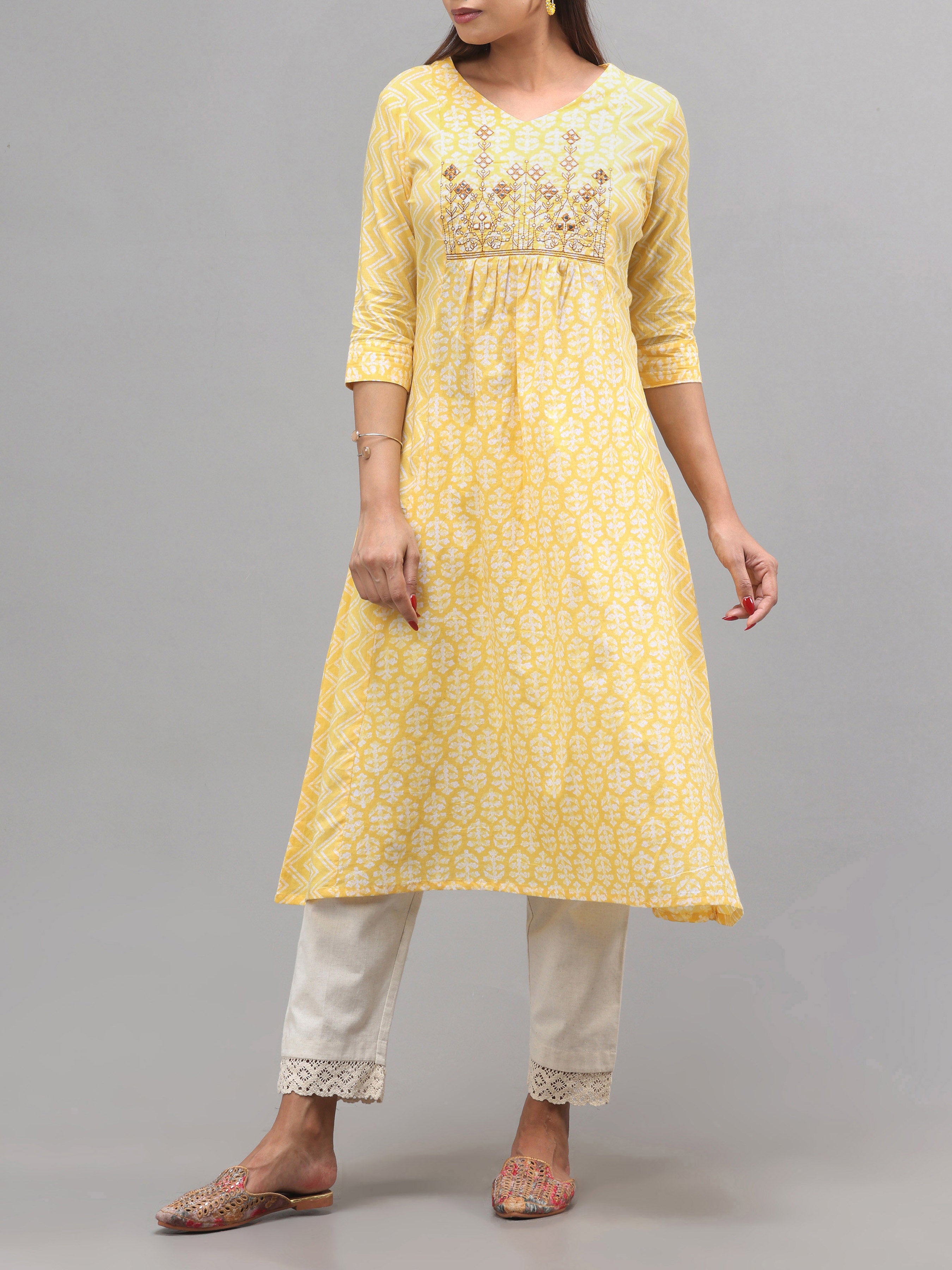 Yellow Pure Cotton Printed Kurti With Embroidery