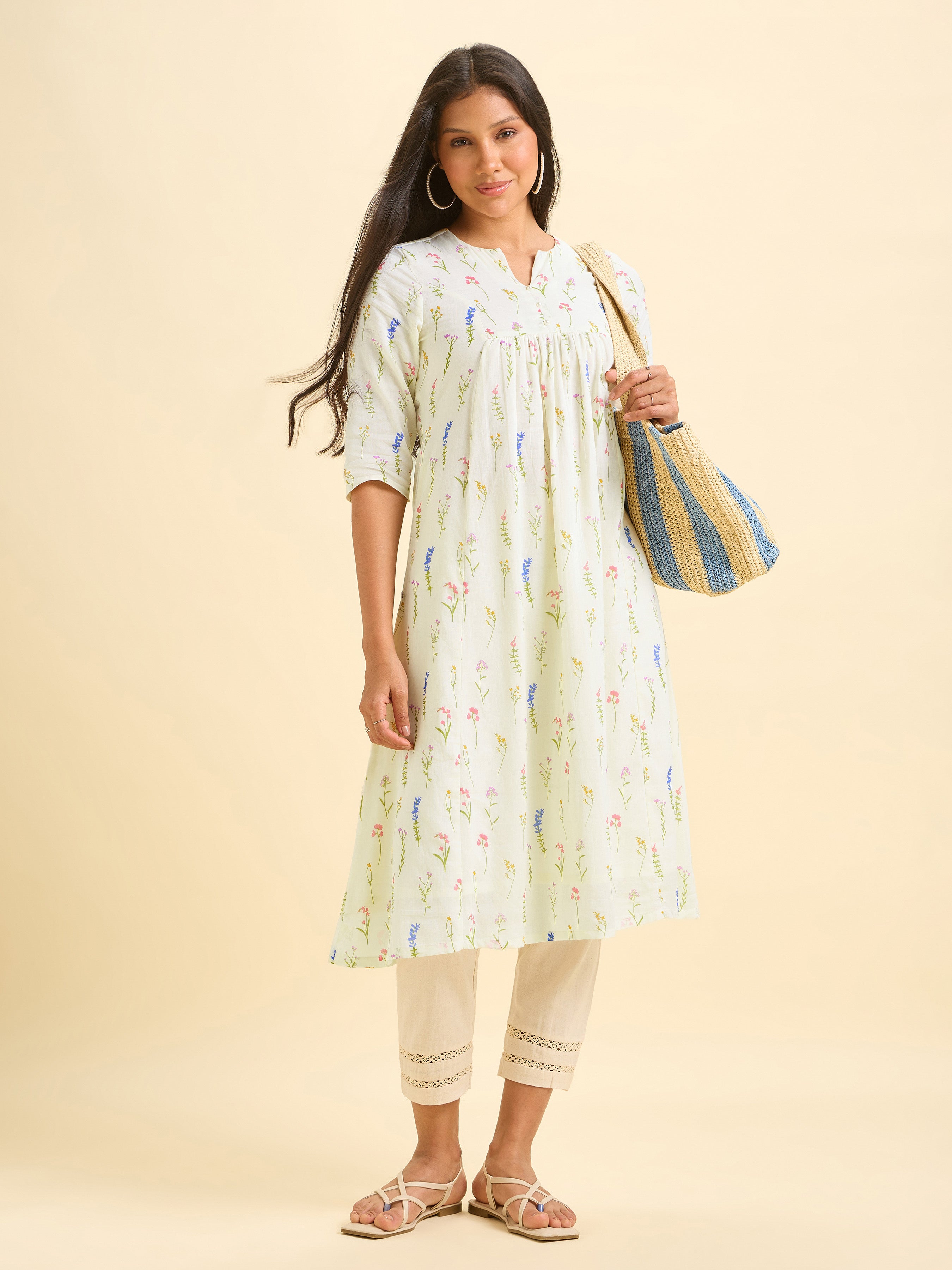 Ivory Pure Cotton Printed Flared Kurti.