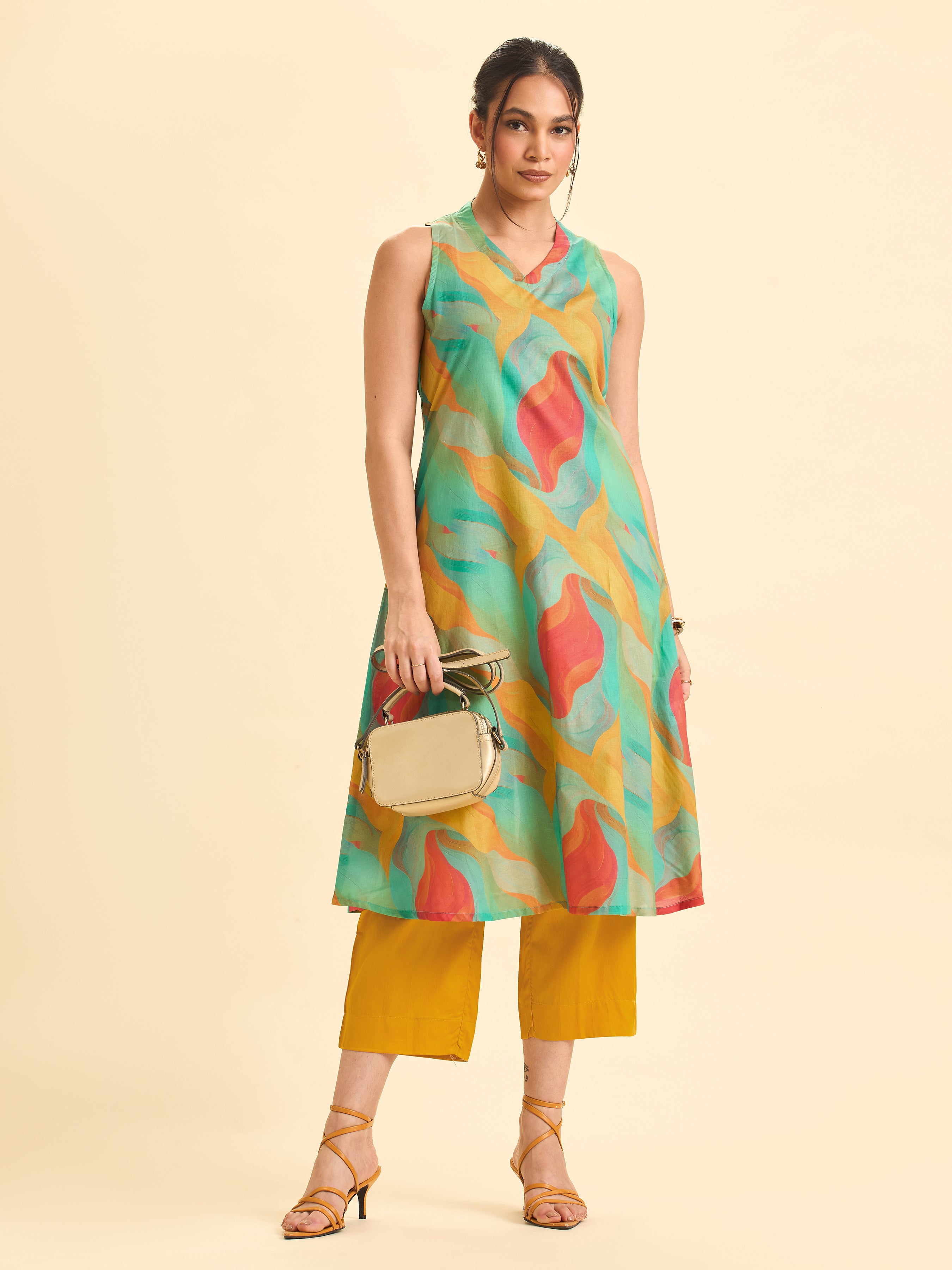 Women Wearing Multi Colour Pure Cotton Printed Flared Kurti Set With Tank -Style Sleeve Less