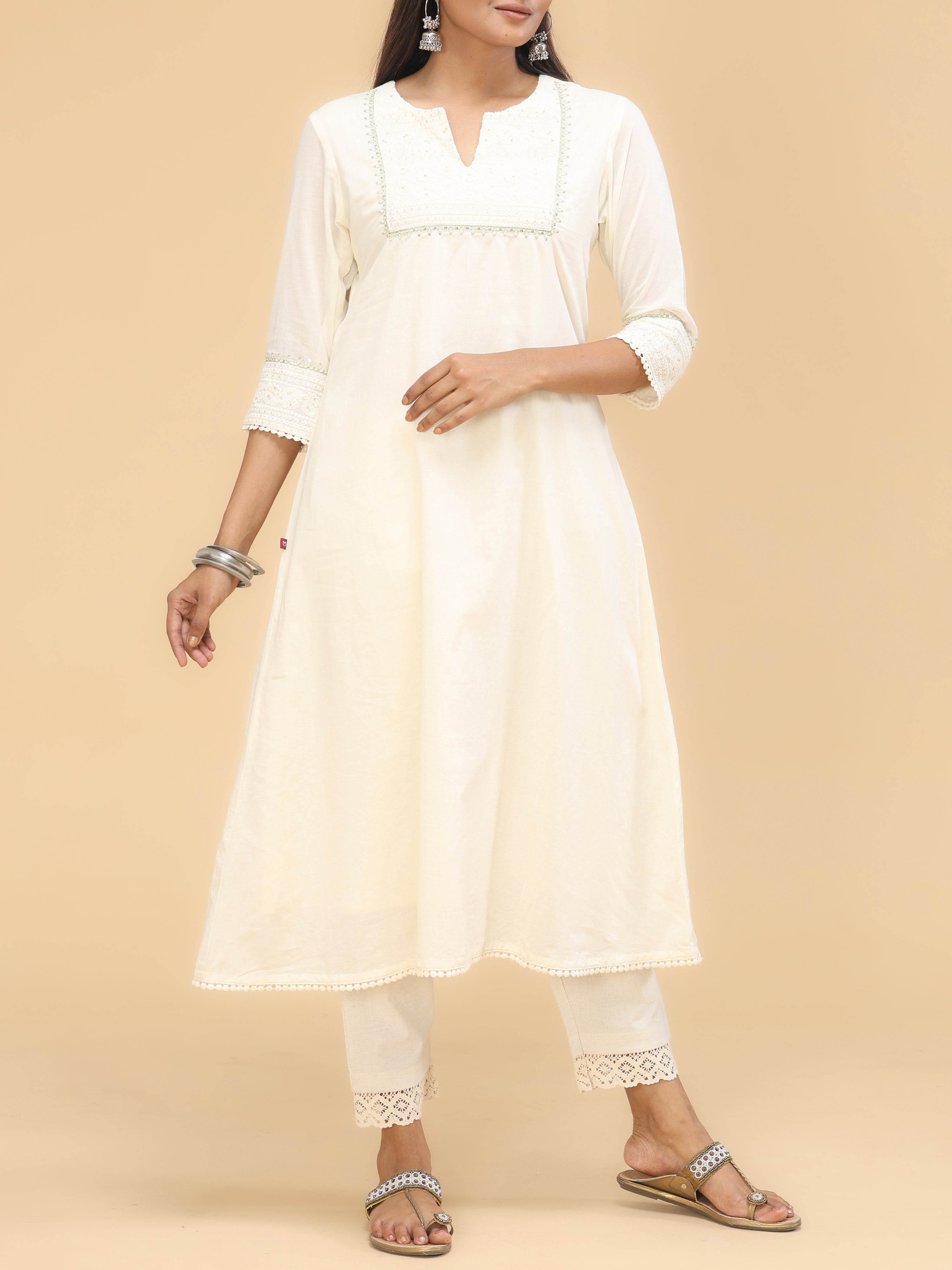 Off-White Cotton Kurti With Embroidery And Sequins Work