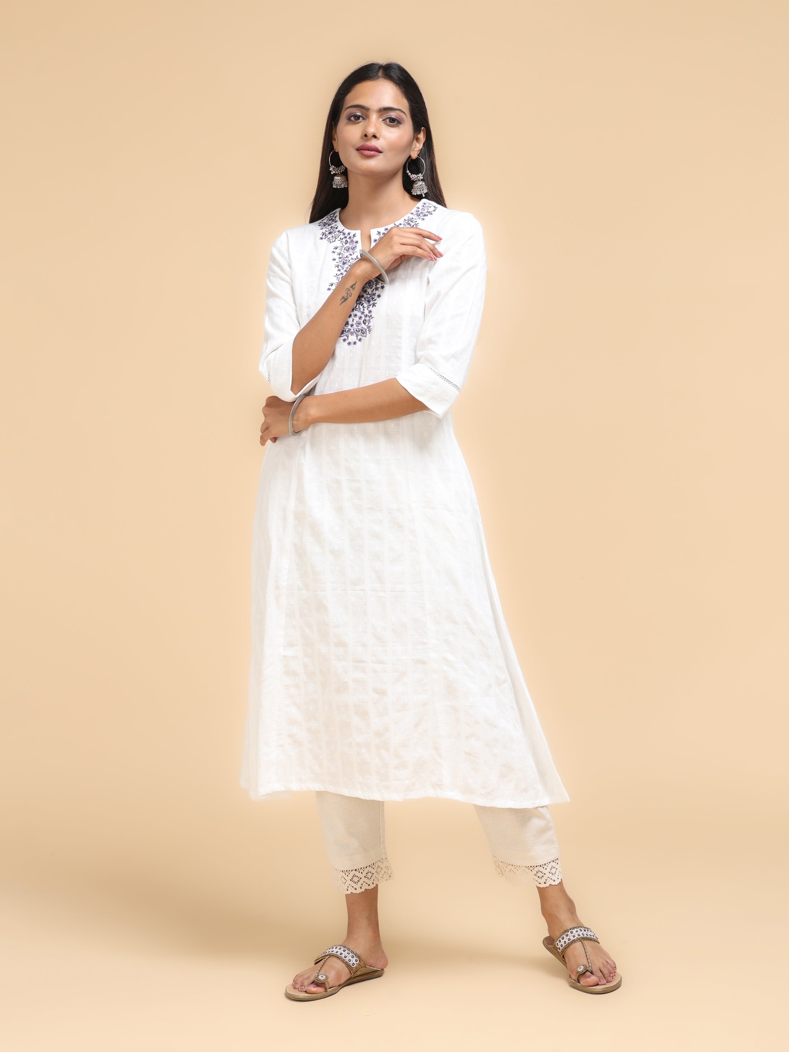 Women Wearing White Cotton Kurti With Embroidery