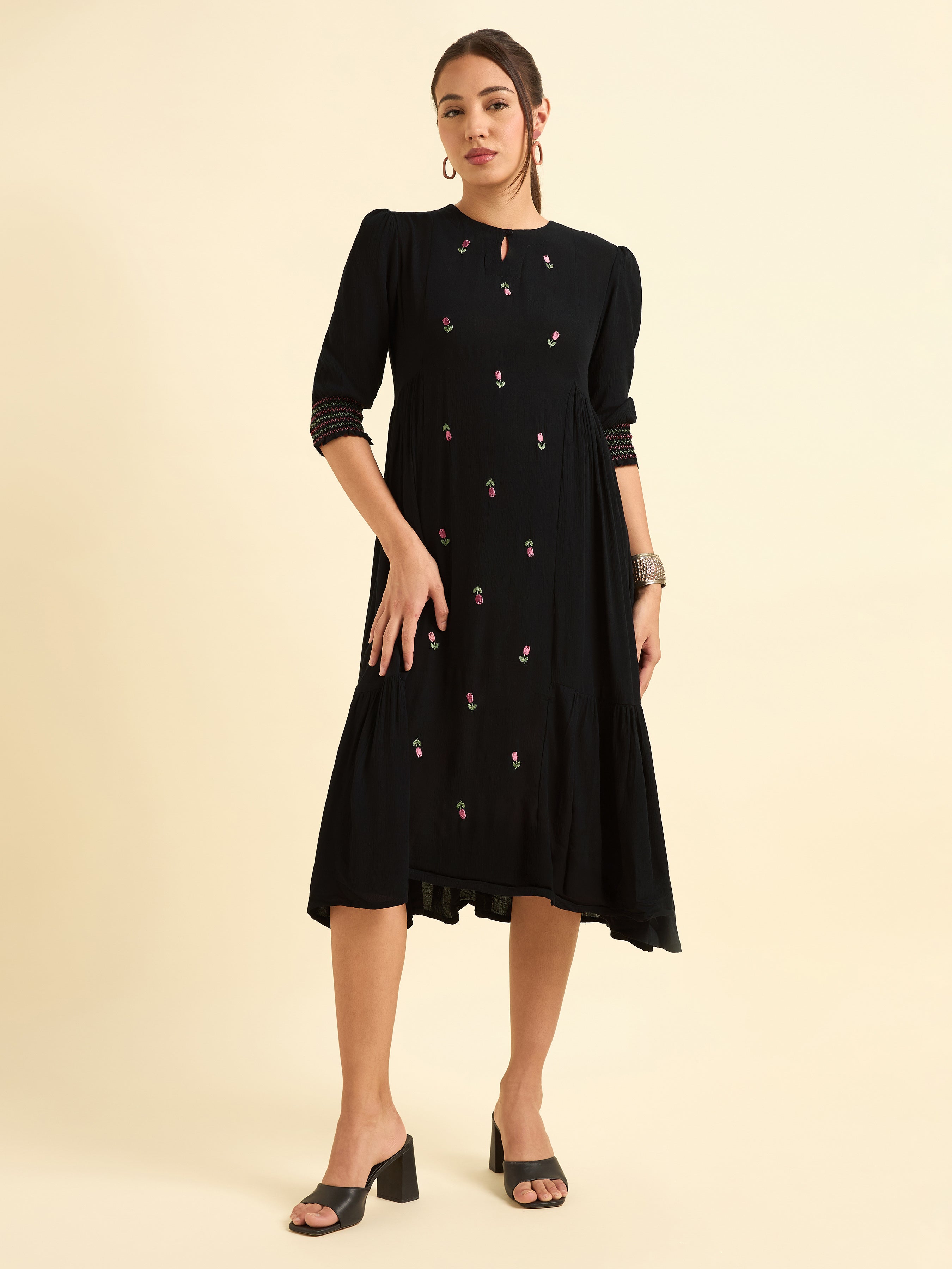 Women Wearing Black Wrinkle Viscose Flared Plain Kurti With Embroidery