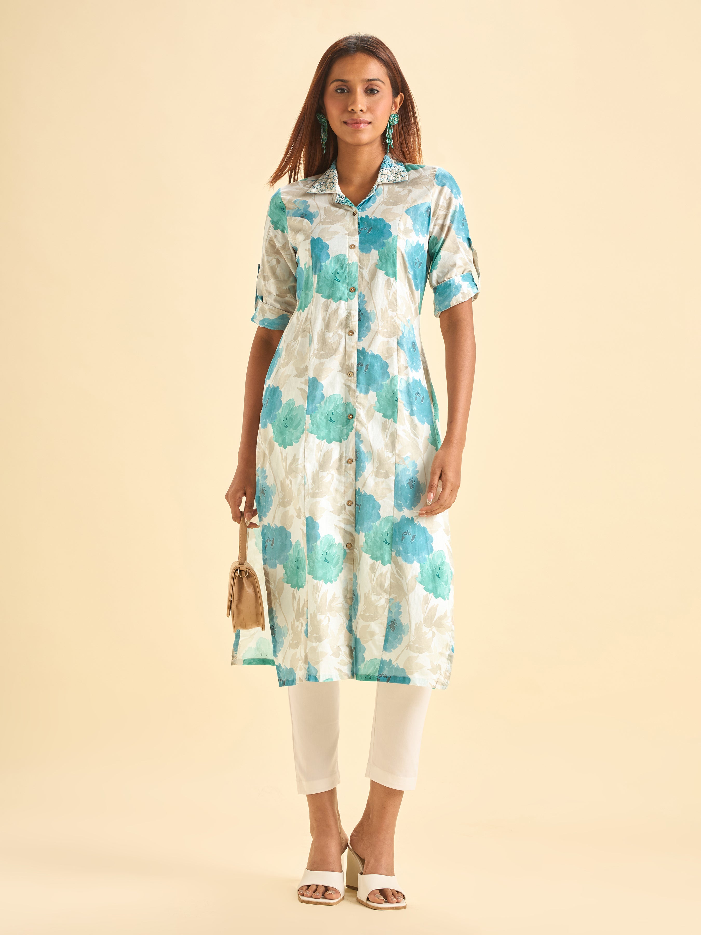 Ivory And Blue Colour Pure Cotton Printed Slited Kurti With Princesscut And Embroidery