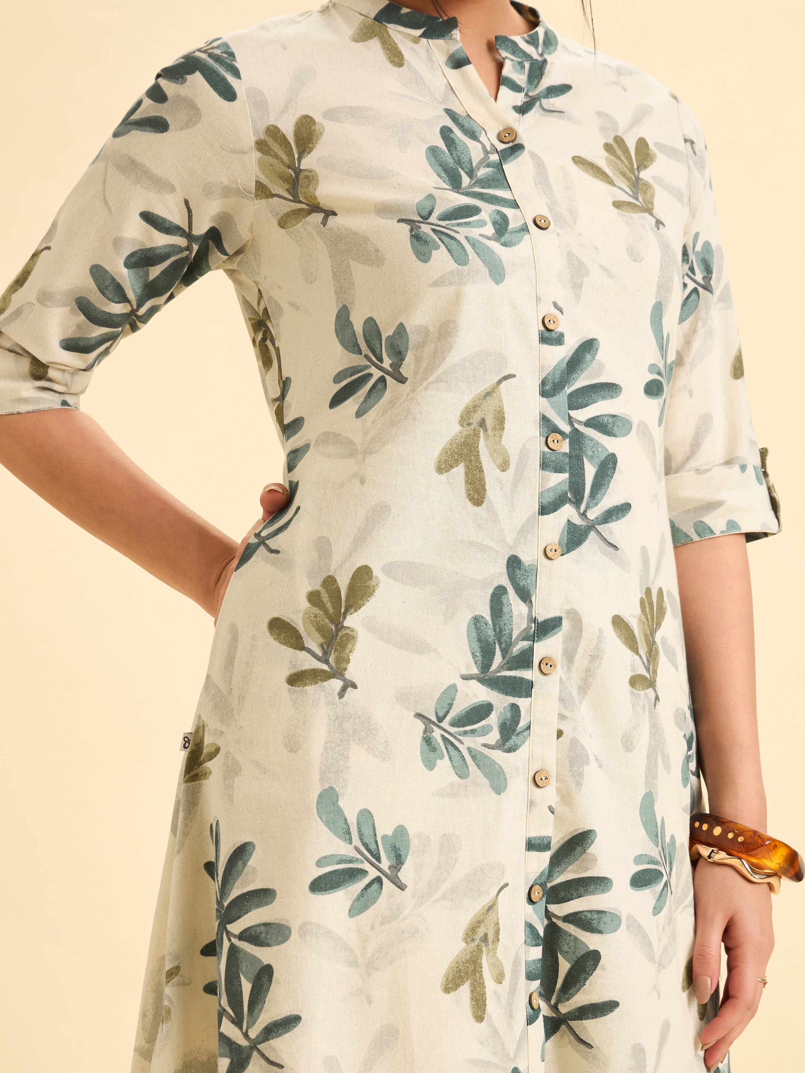 Ivory Cotton Flax Flared Kurti With Multi Colour Print And Curved Hem