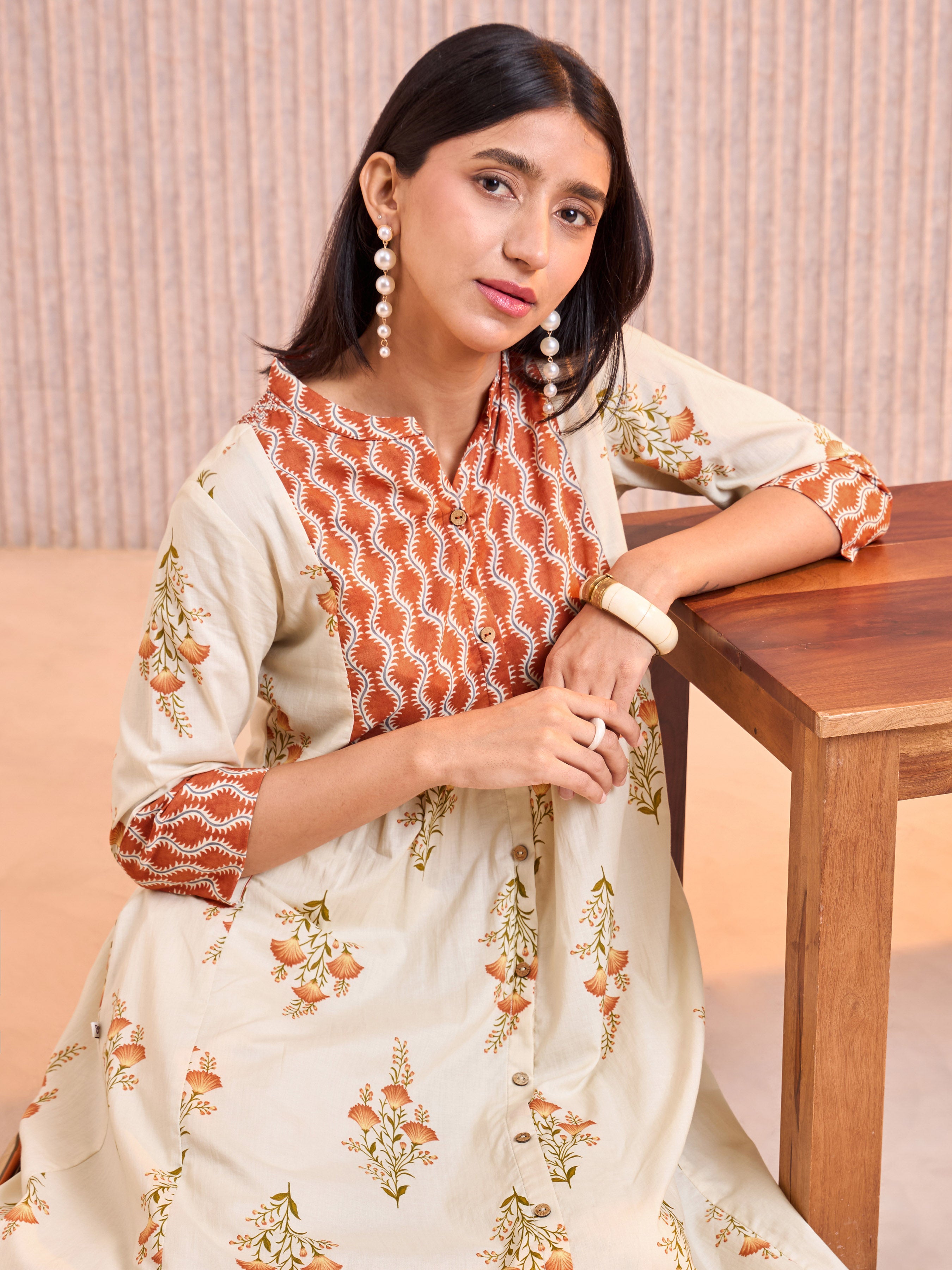 Beige Cotton Printed Kurti With Smocking Embroidery