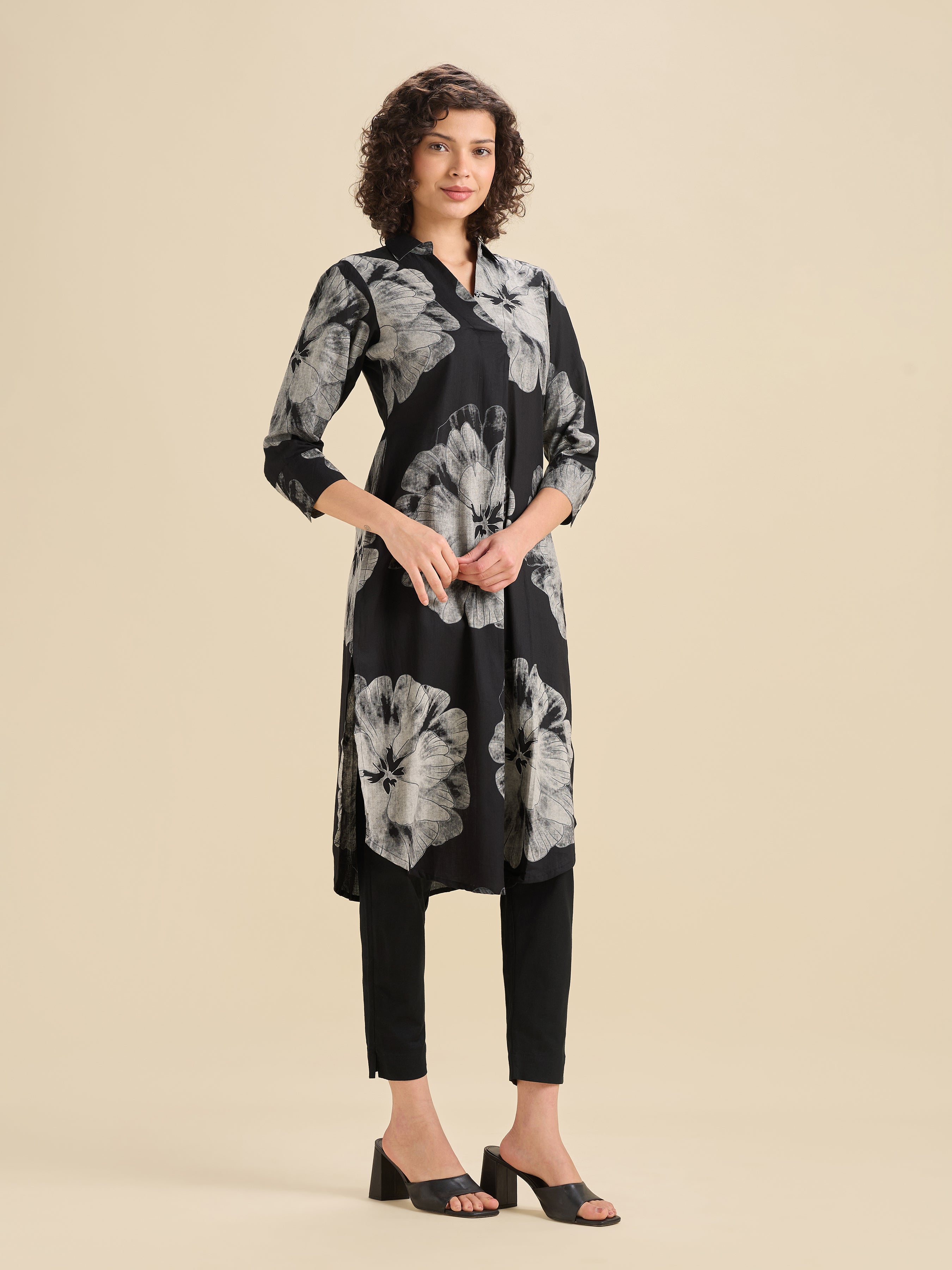 Black And White Pure Cotton Printed Slited Kurti With Knife Pleats And Curved Hem Line
