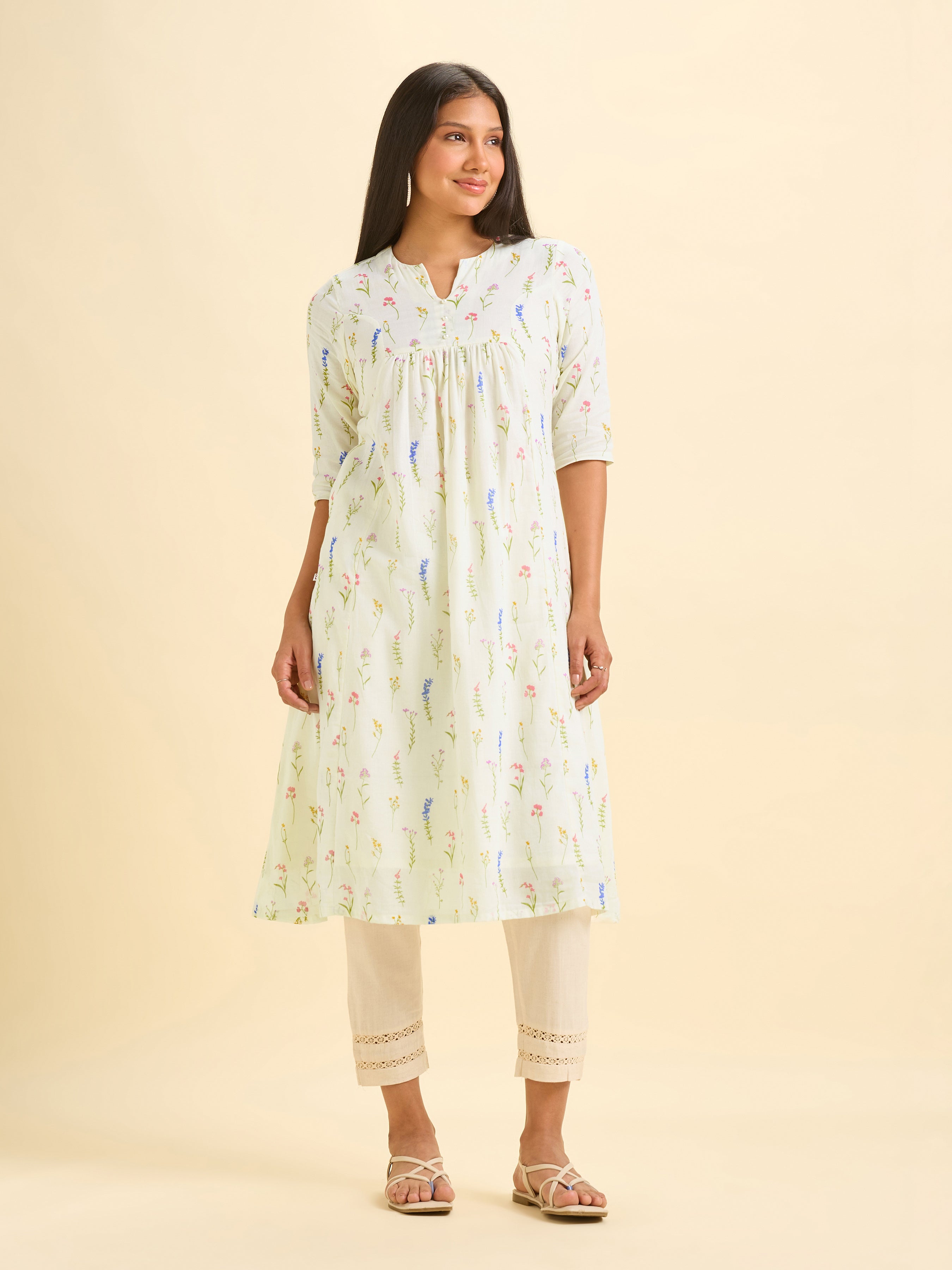 Ivory Pure Cotton Printed Flared Kurti.