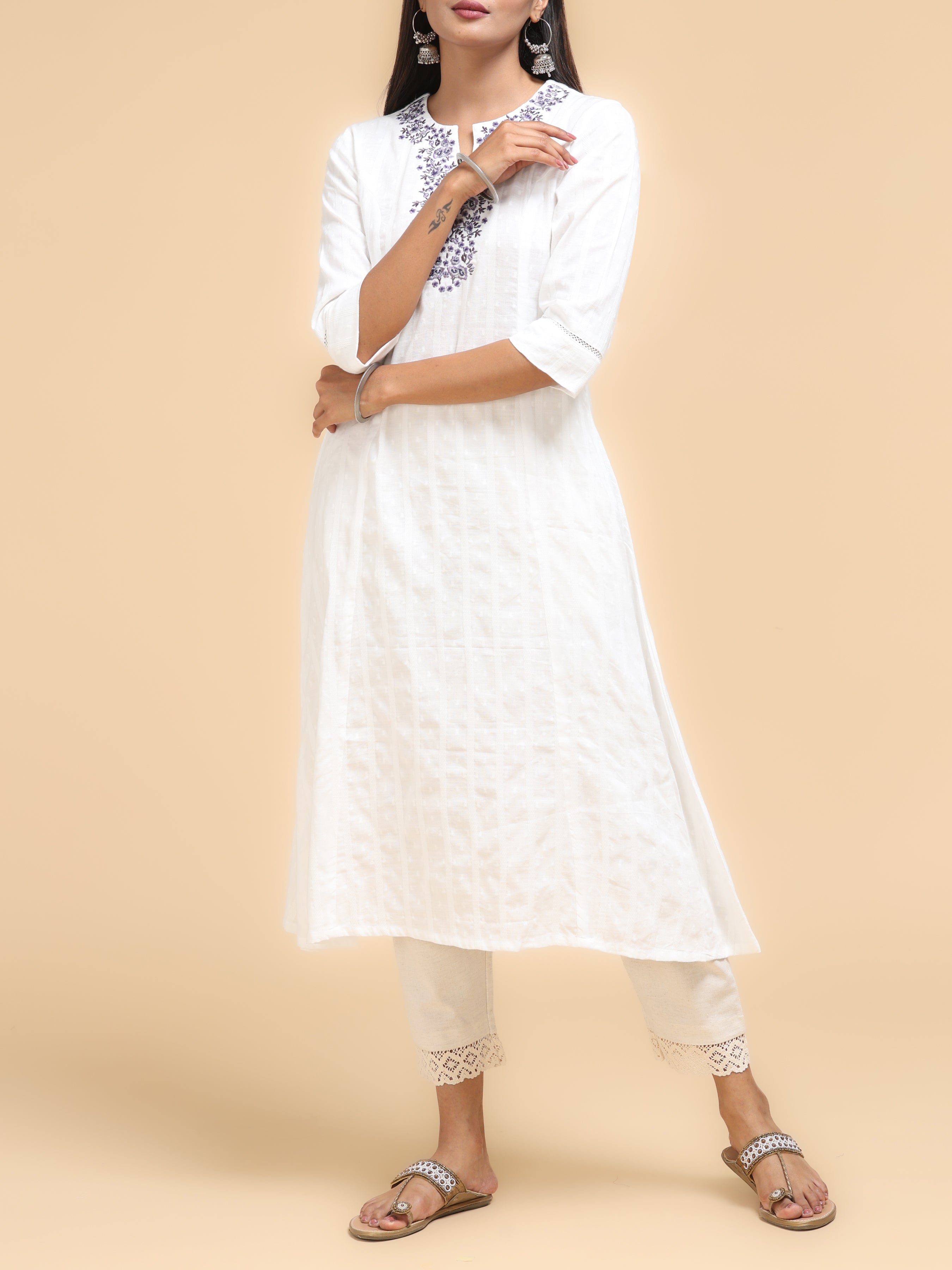 Women Wearing White Cotton Kurti With Embroidery
