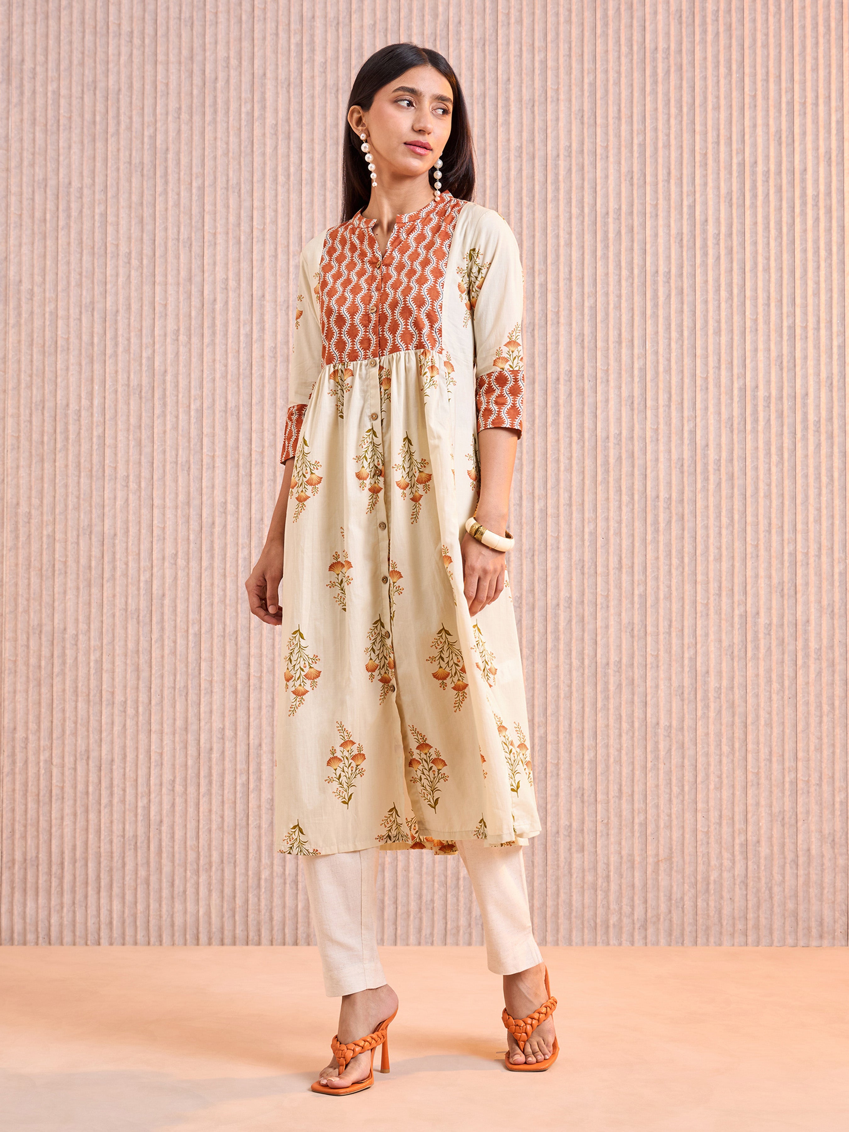 Beige Cotton Printed Kurti With Smocking Embroidery