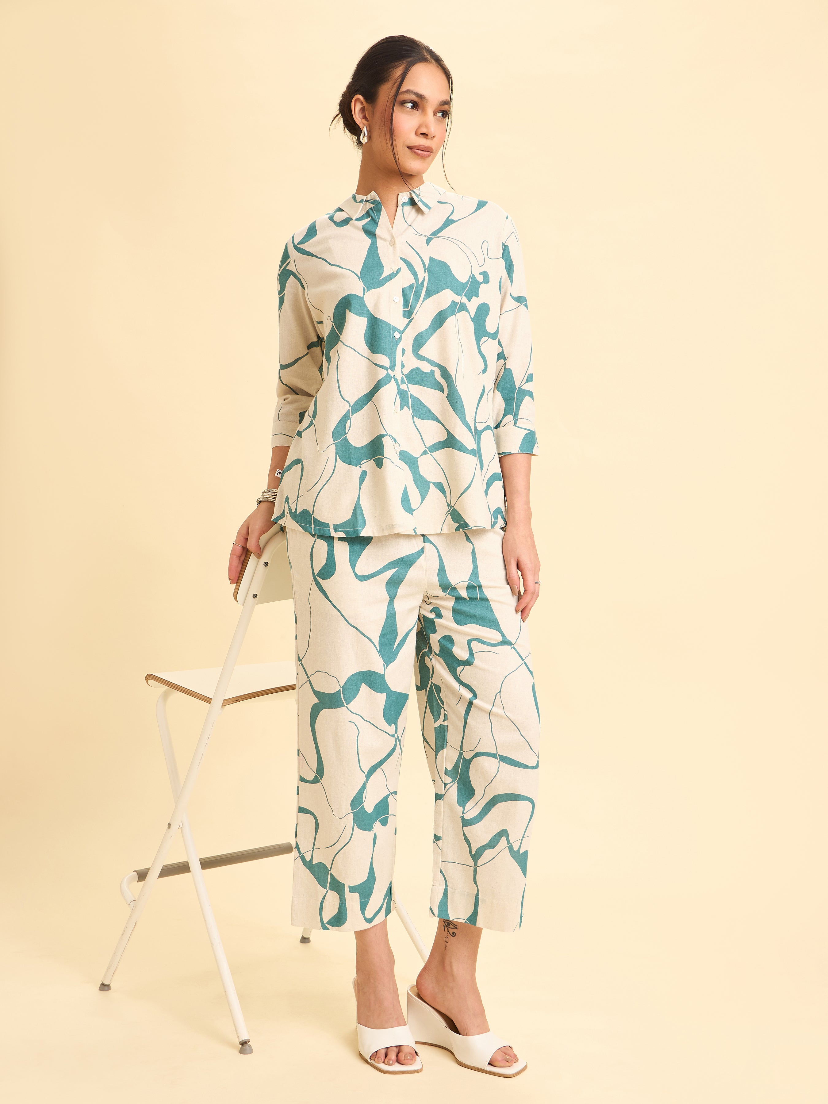 Ivory And Teal Cotton Flax Printed Flared Kurti With Curved Hem