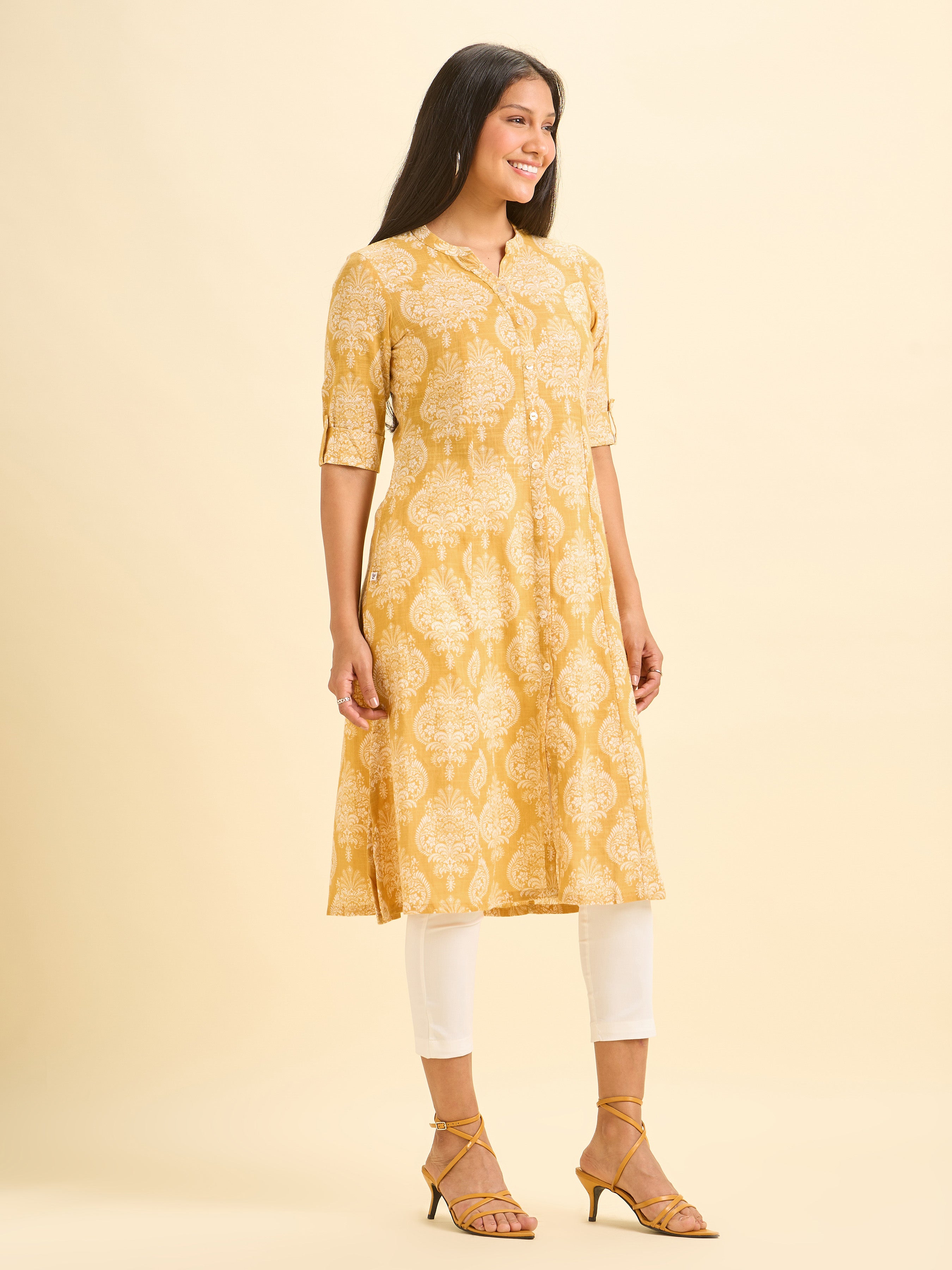 Mustard And White Cotton Slub Printed Flared Kurti With Princess Cut