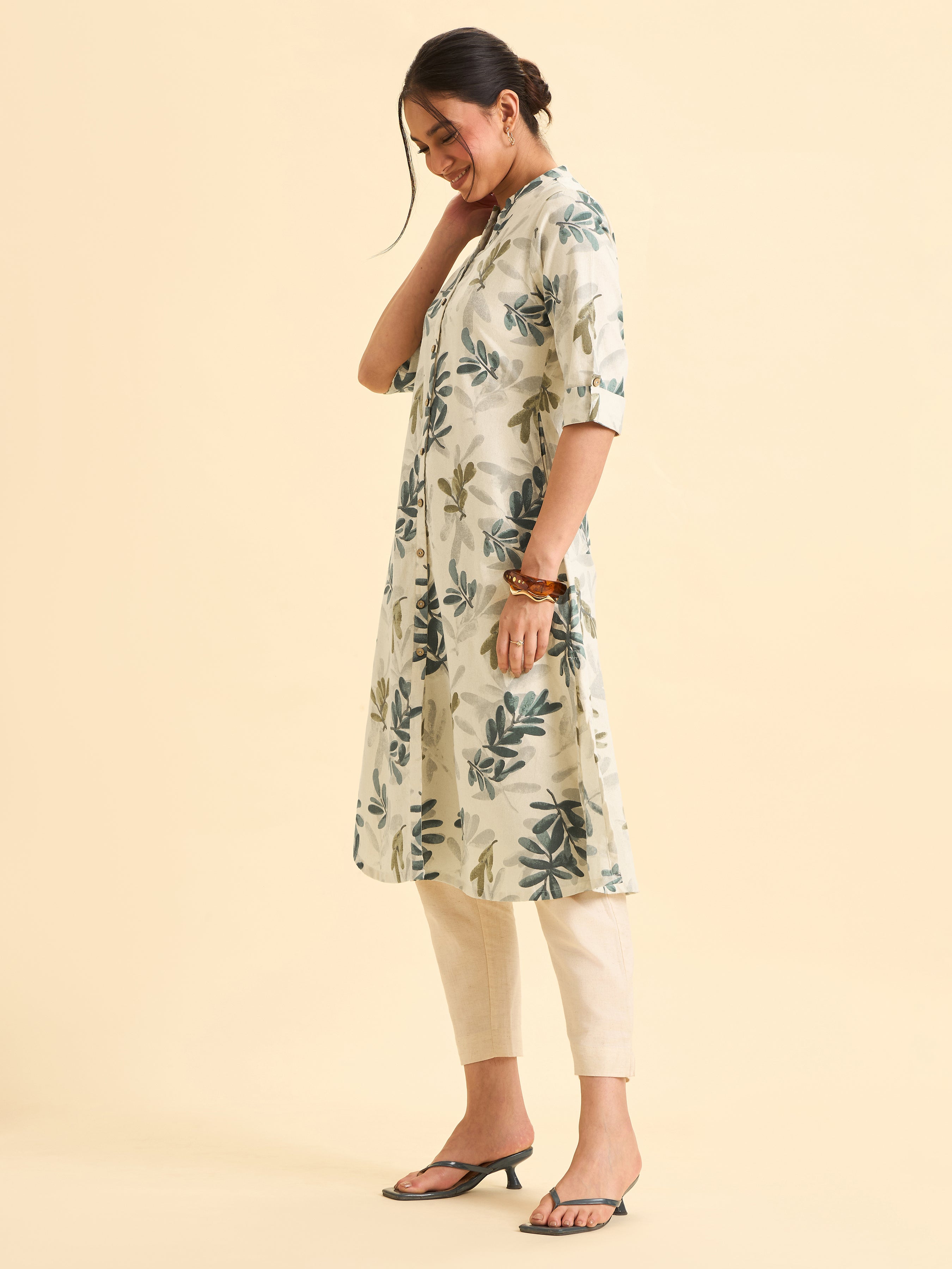 Ivory Cotton Flax Flared Kurti With Multi Colour Print And Curved Hem