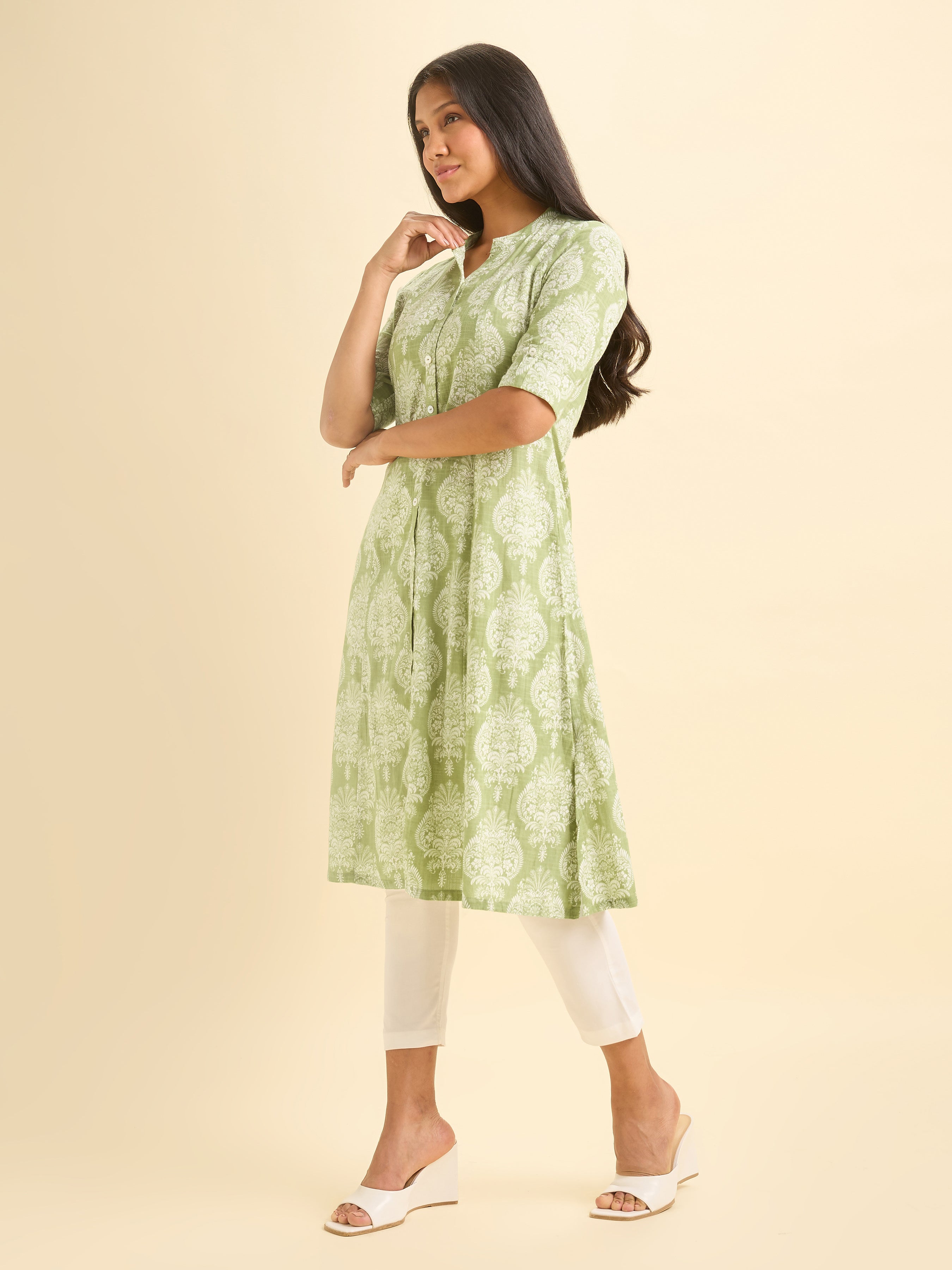 Pista Green And White Cotton Slub Printed Flared Kurti With Princess Cut