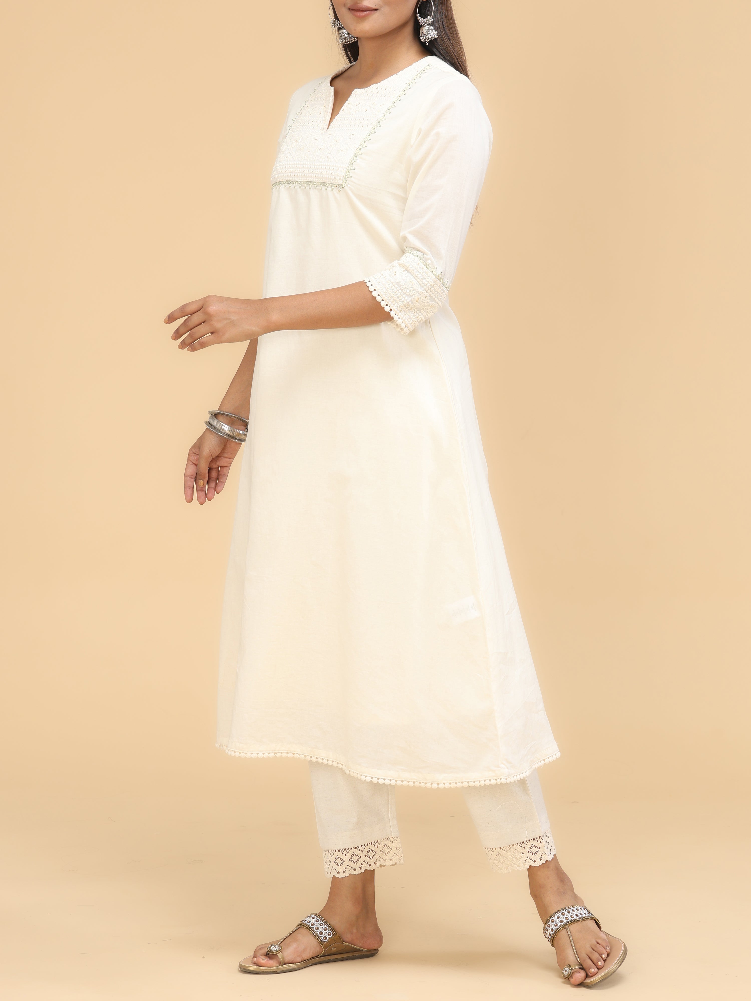 Off-White Cotton Kurti With Embroidery And Sequins Work