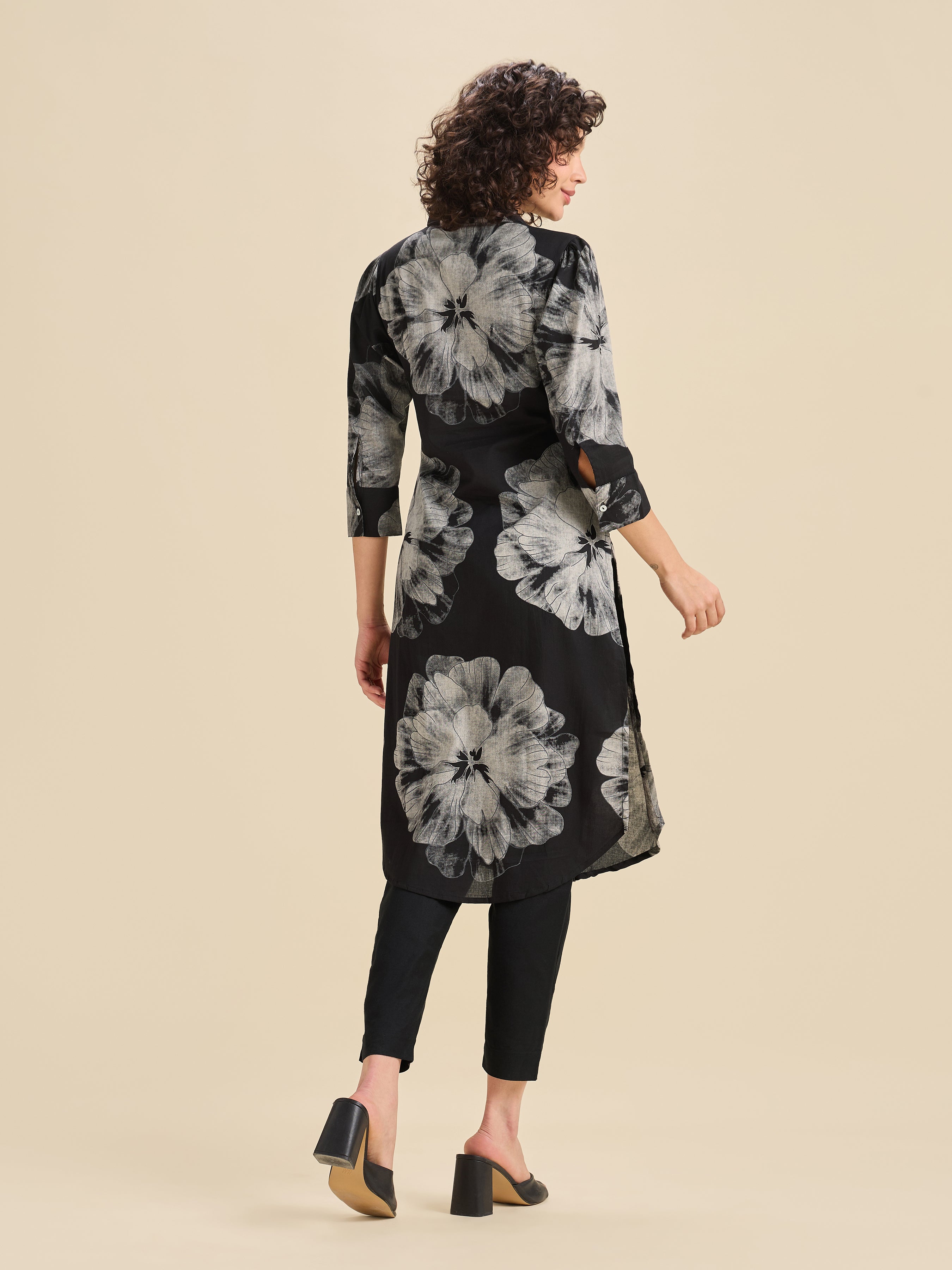 Black And White Pure Cotton Printed Slited Kurti With Knife Pleats And Curved Hem Line