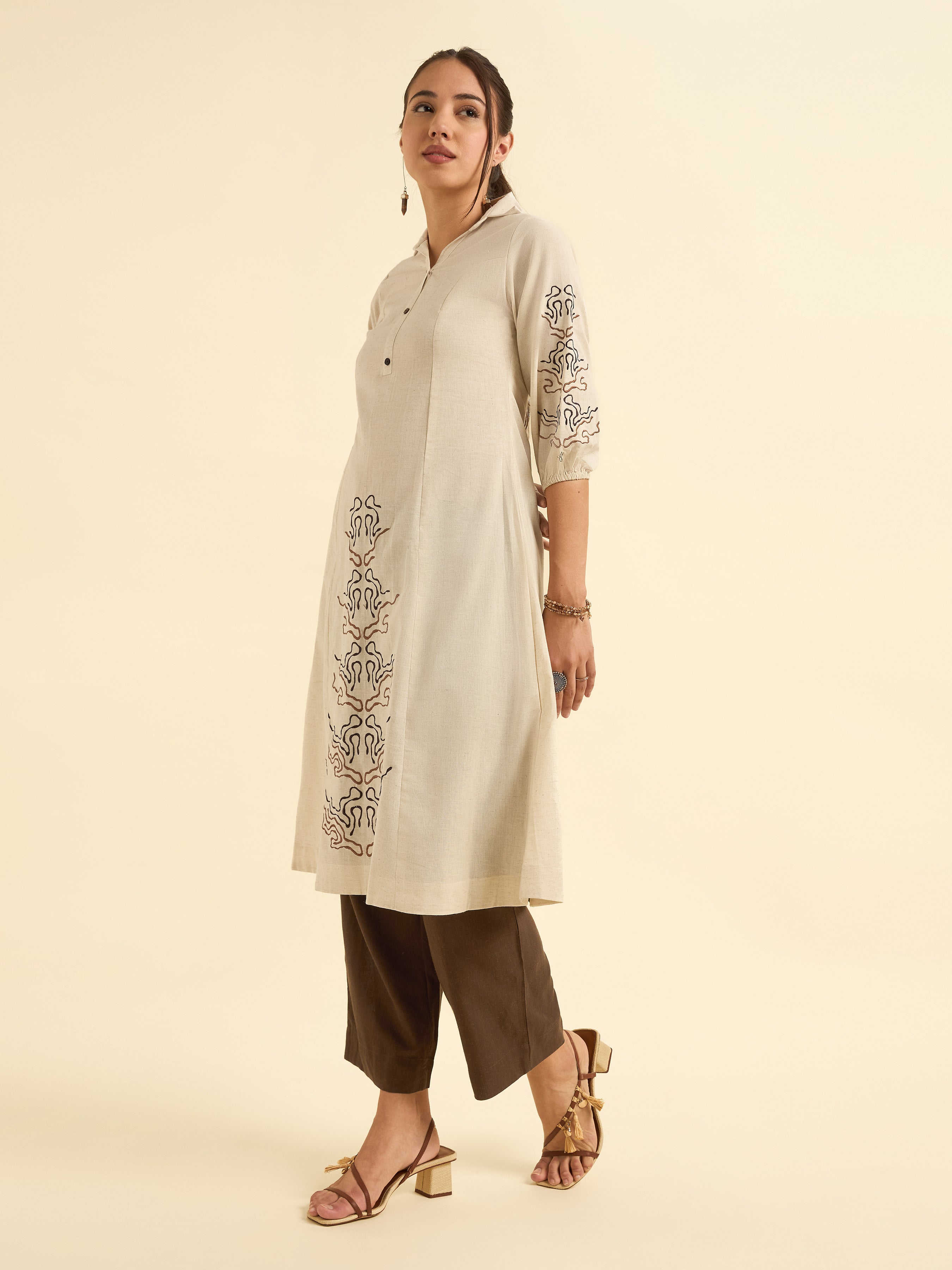 Ivory Cotton Flax Flared Kurti With Princess Cut And Embroidery