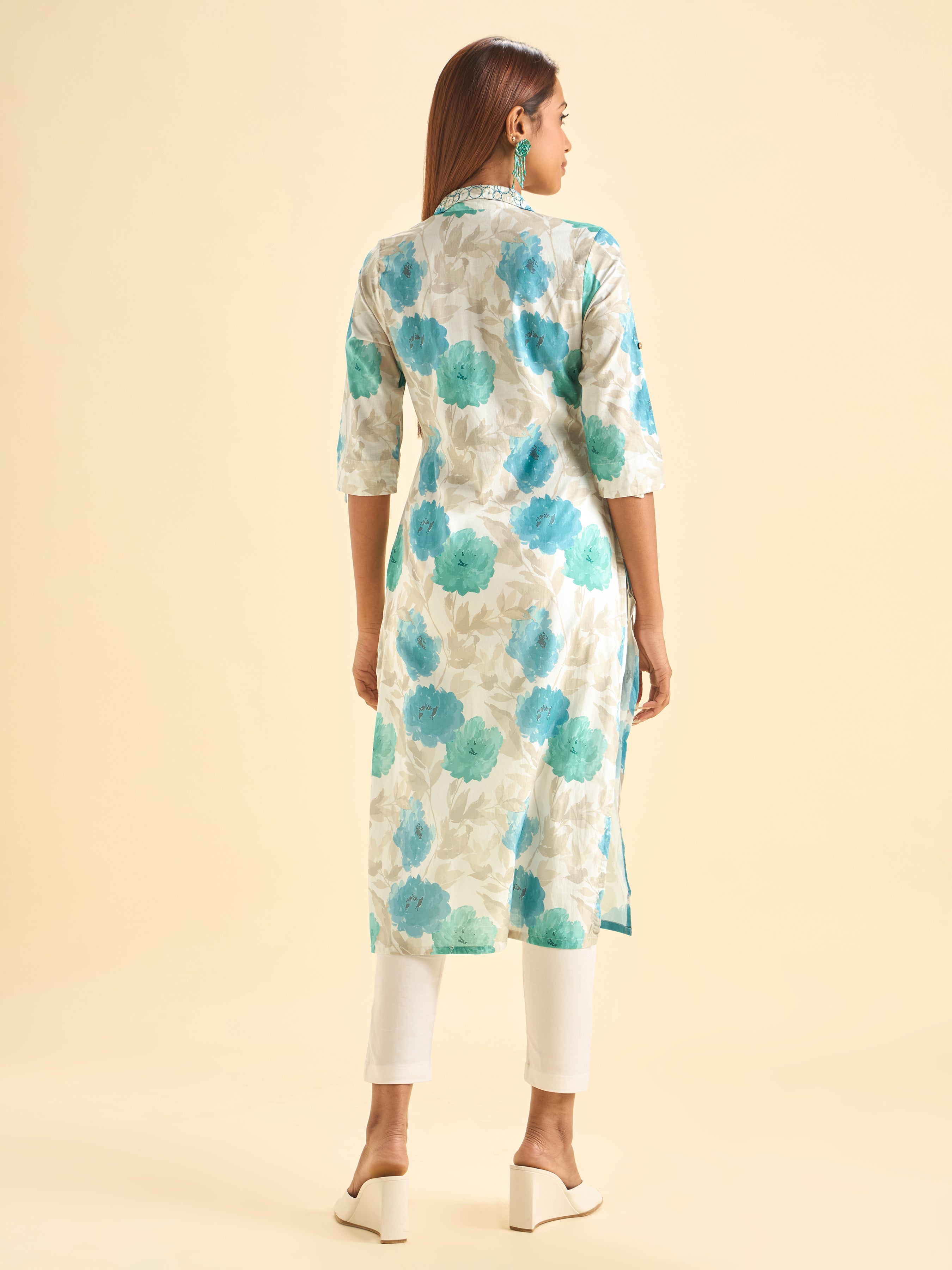 Ivory And Blue Colour Pure Cotton Printed Slited Kurti With Princesscut And Embroidery