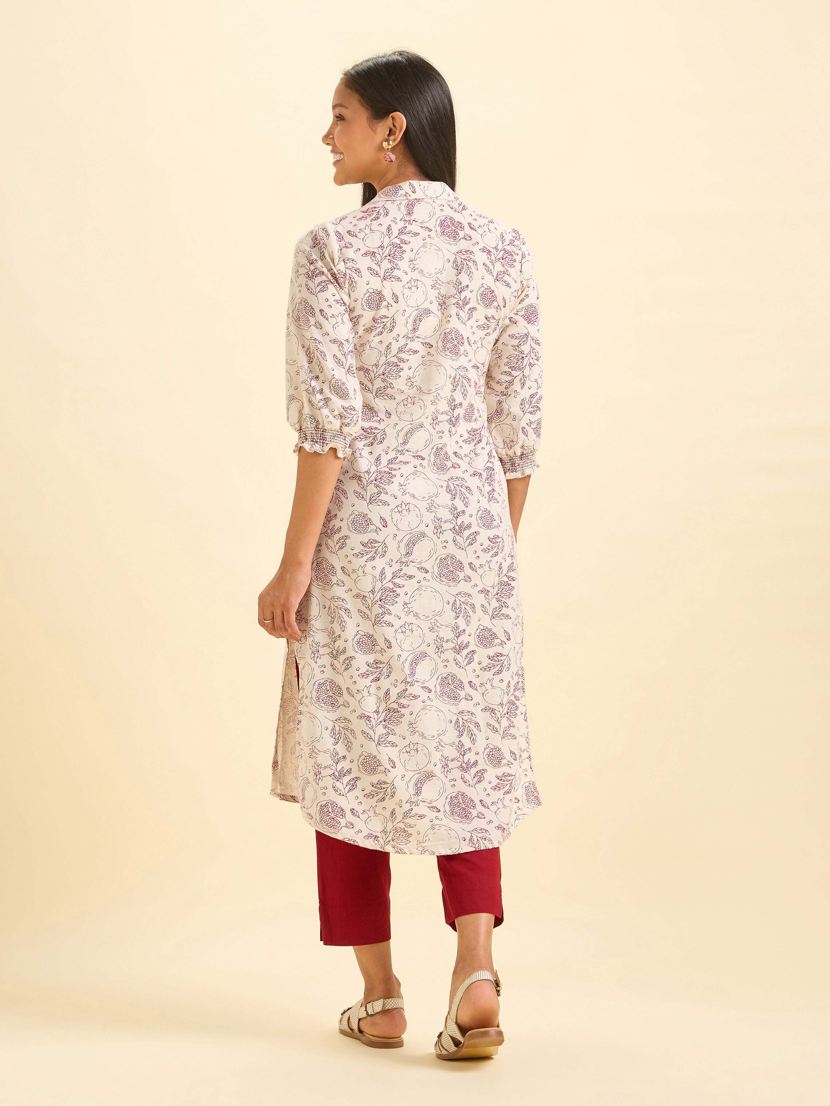 Ivory Cotton Flax Slub Printed Kurti With Samocked Sleeve Cuff