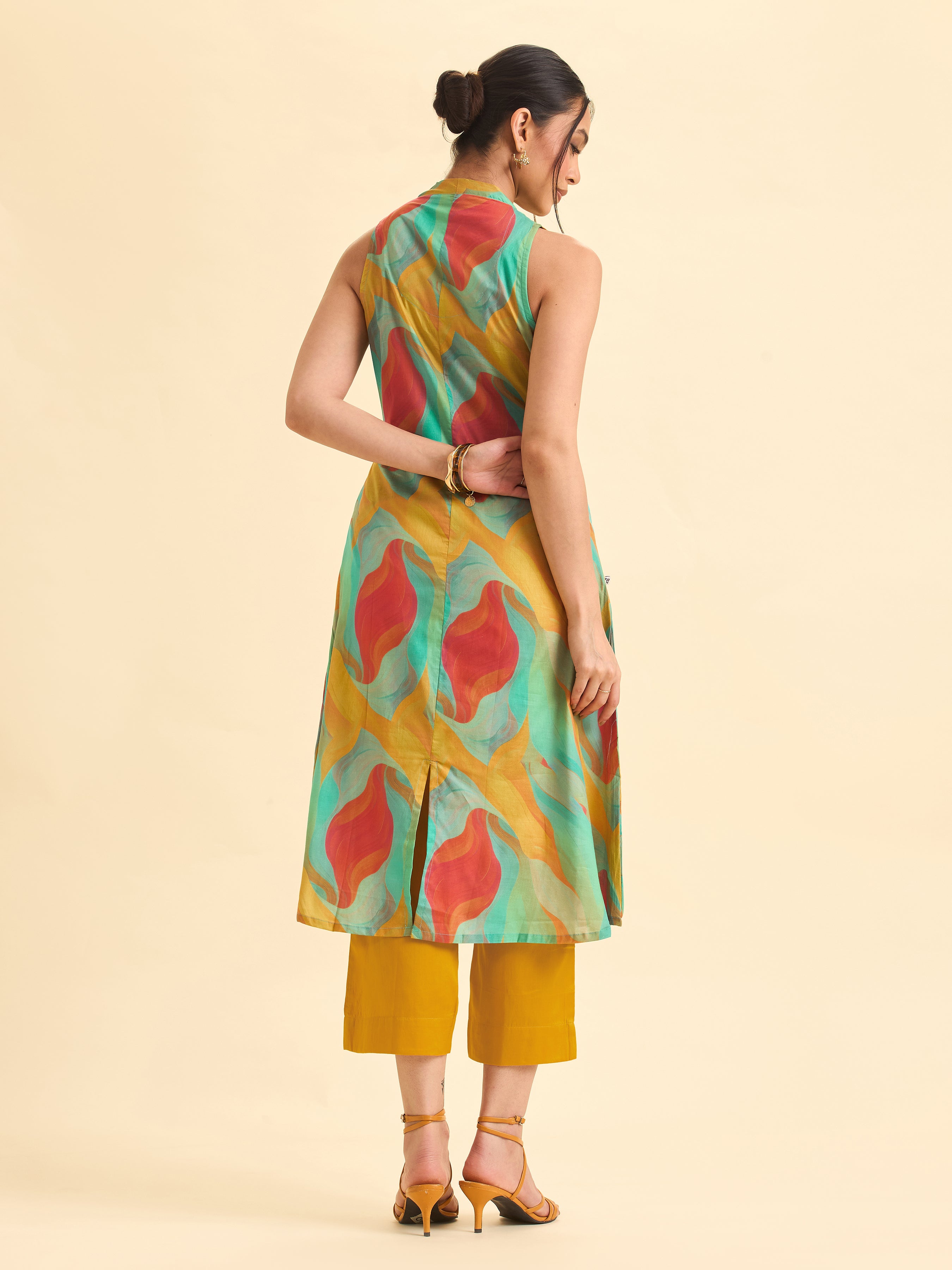 Women Wearing Multi Colour Pure Cotton Printed Flared Kurti Set With Tank -Style Sleeve Less