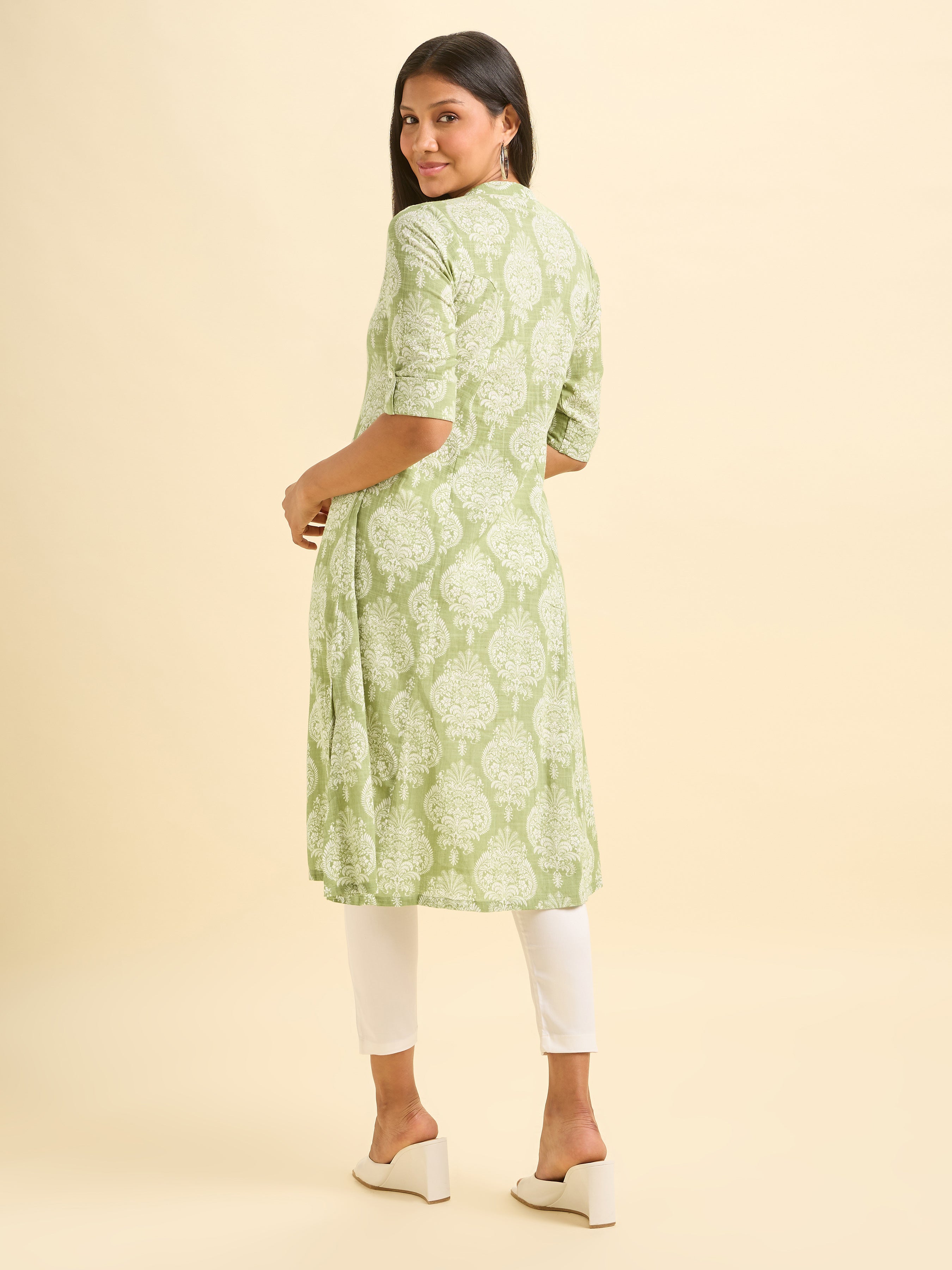 Pista Green And White Cotton Slub Printed Flared Kurti With Princess Cut