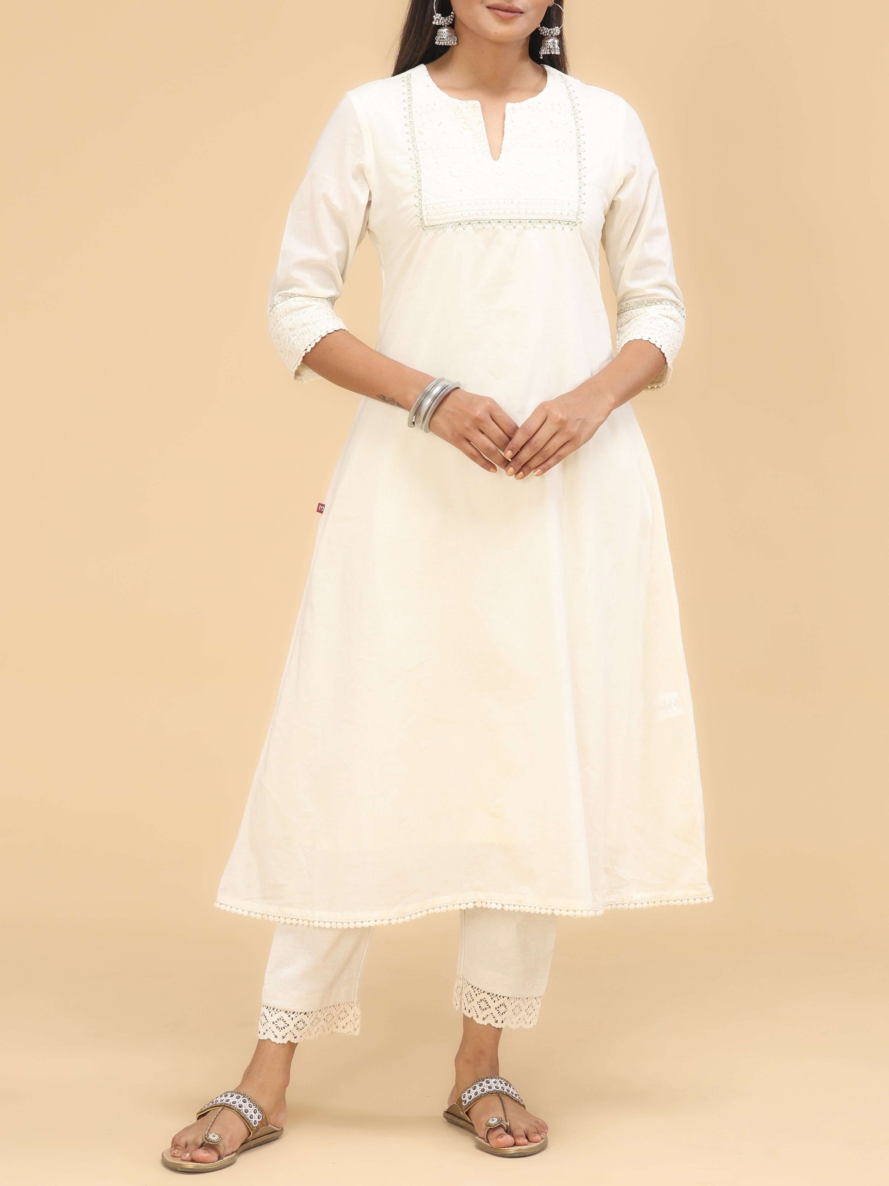Off-White Cotton Kurti With Embroidery And Sequins Work