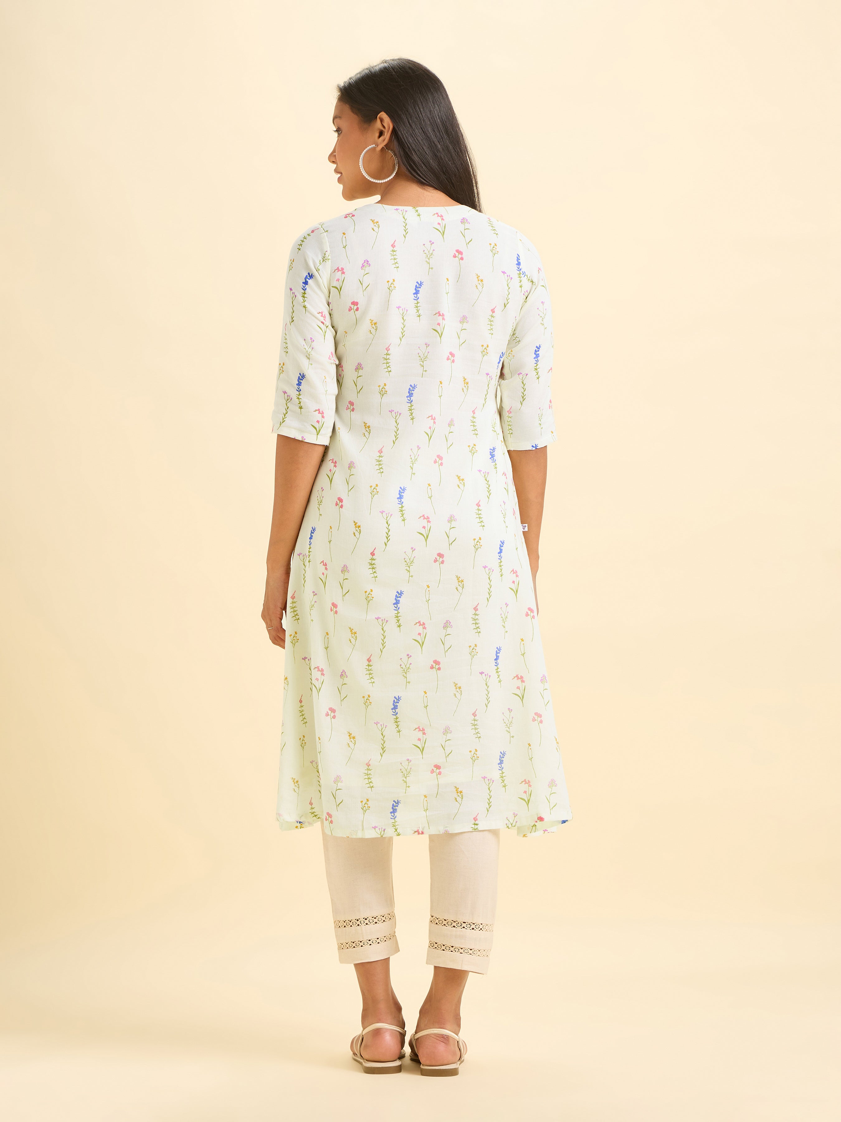 Ivory Pure Cotton Printed Flared Kurti.