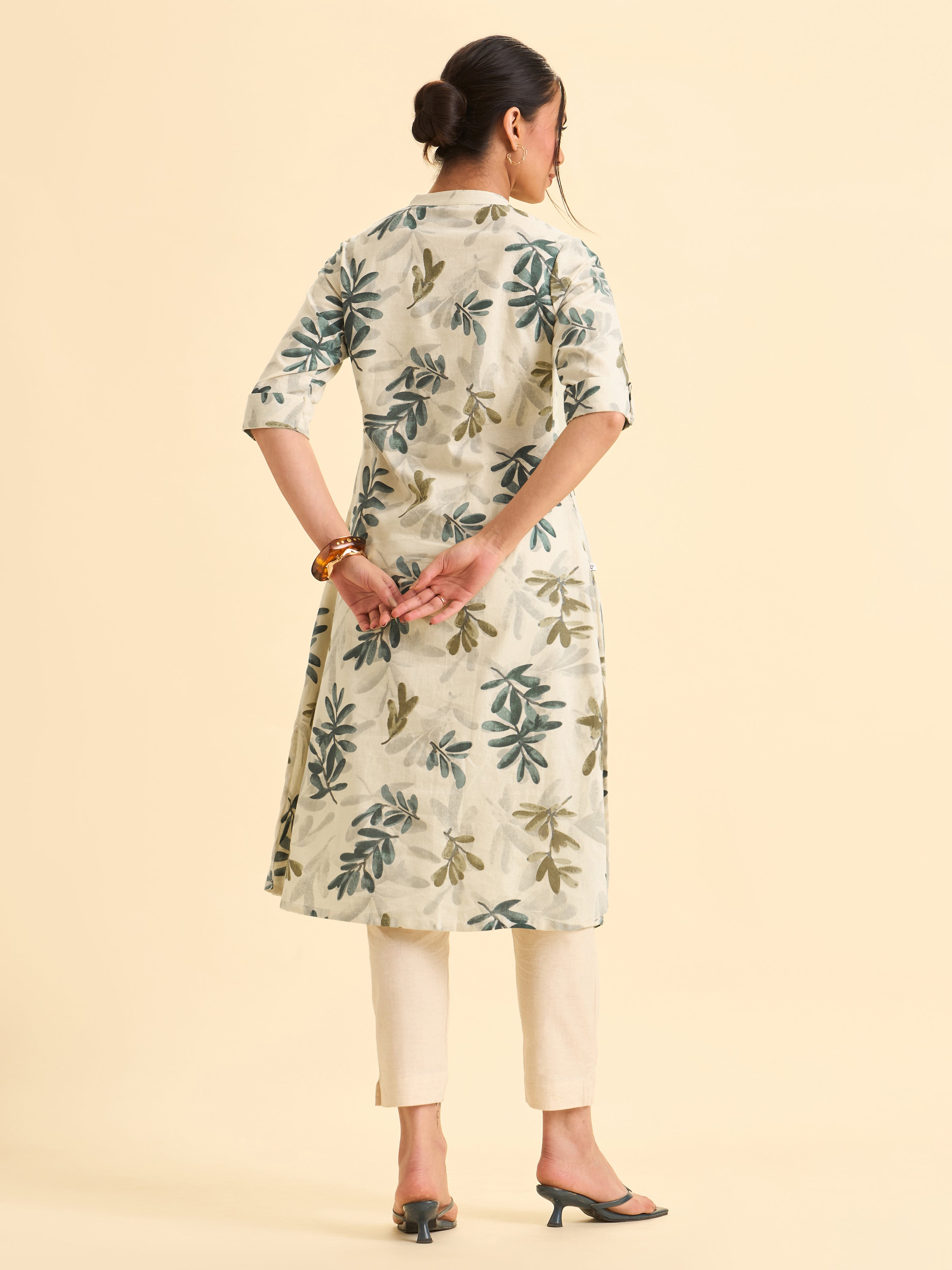 Ivory Cotton Flax Flared Kurti With Multi Colour Print And Curved Hem