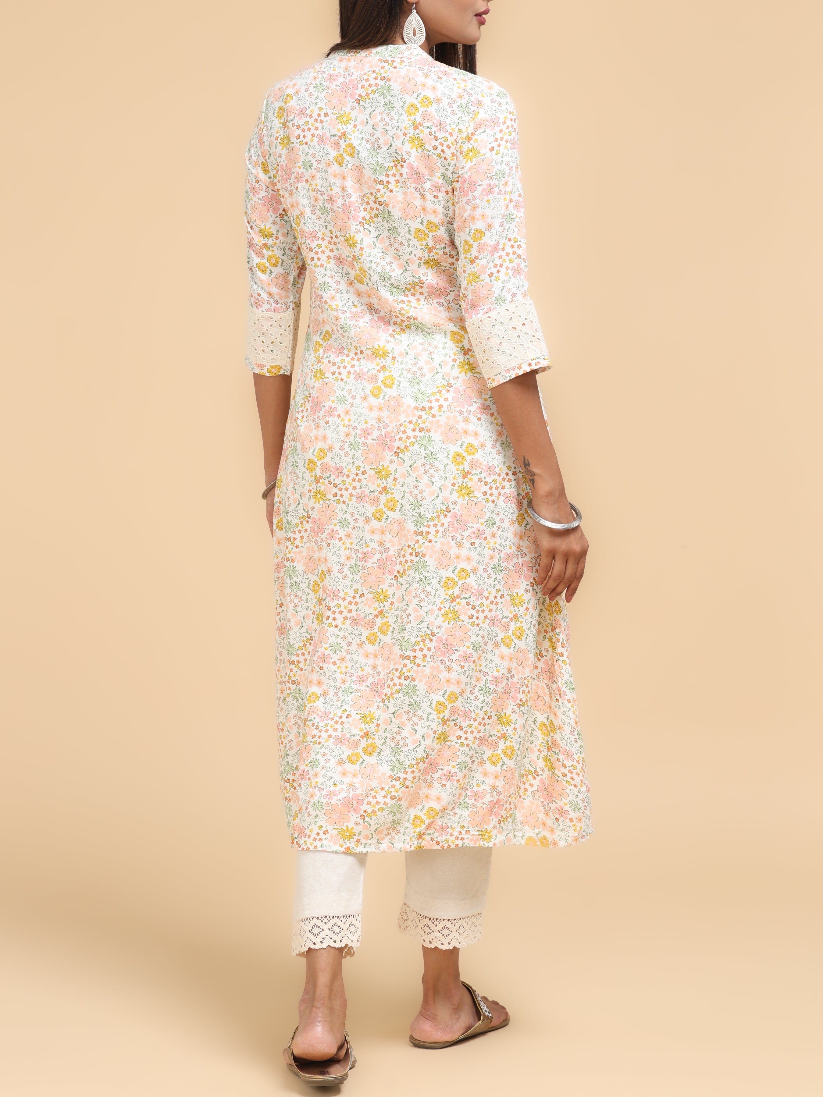 Women Wearing Multi-Color Cotton Kurti With Floral Print