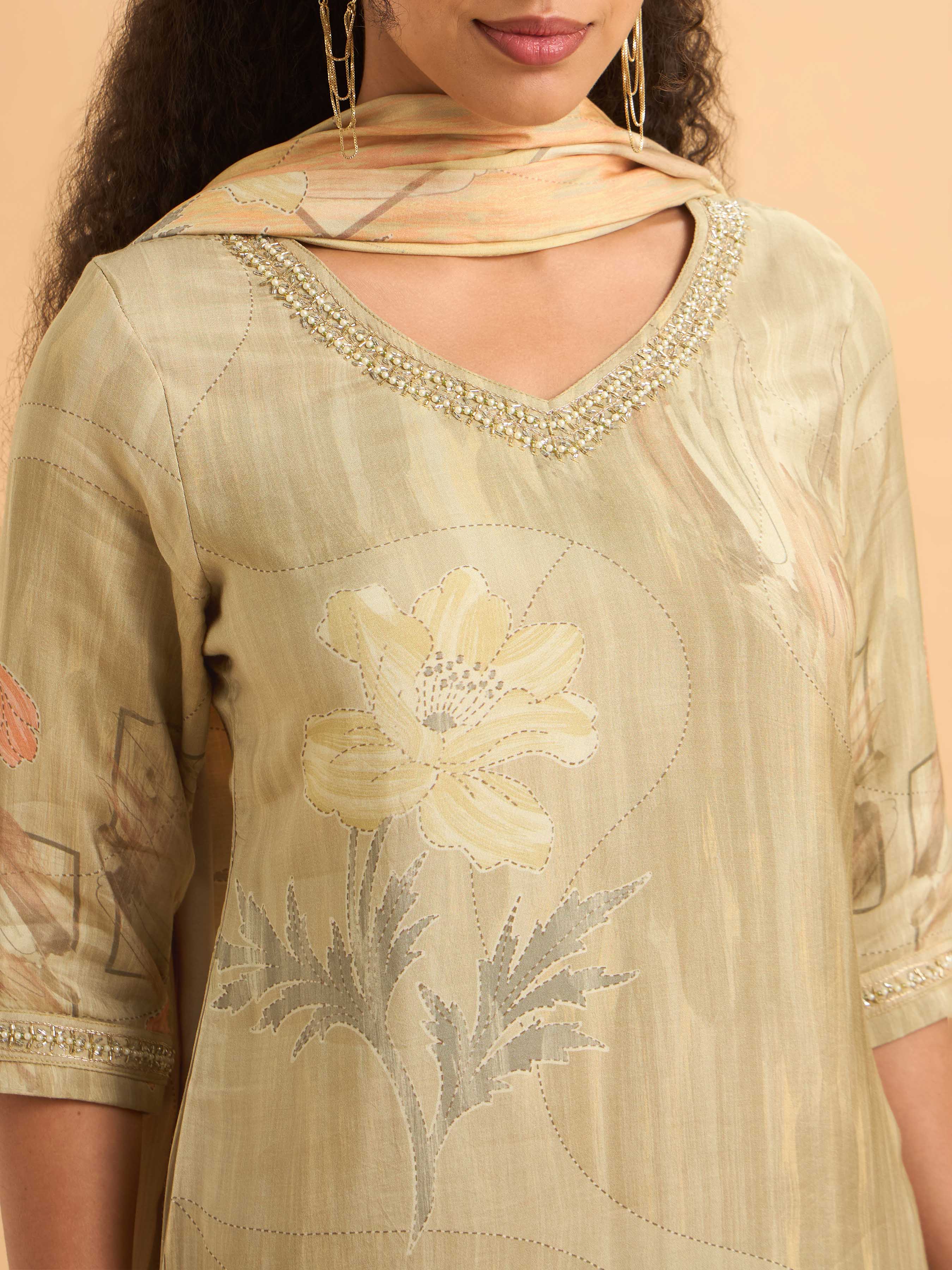 Beige Muslin Slitted Kurti Set With S cut Bead Work Styled With Printed Dupatta