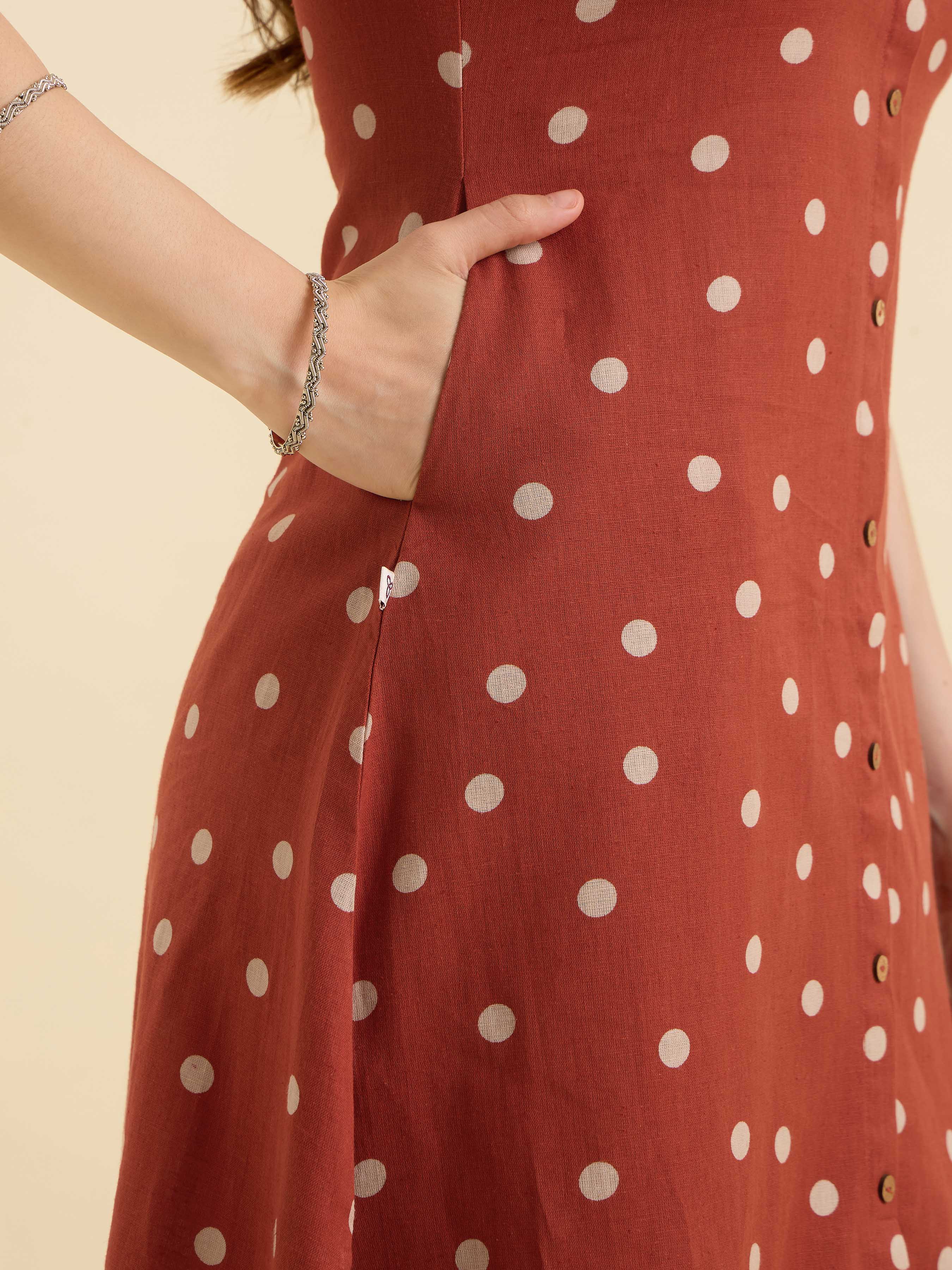 Brick Red Ivory Cotton Flax Printed Flared Sleeveless Kurti Set With Centre Cut