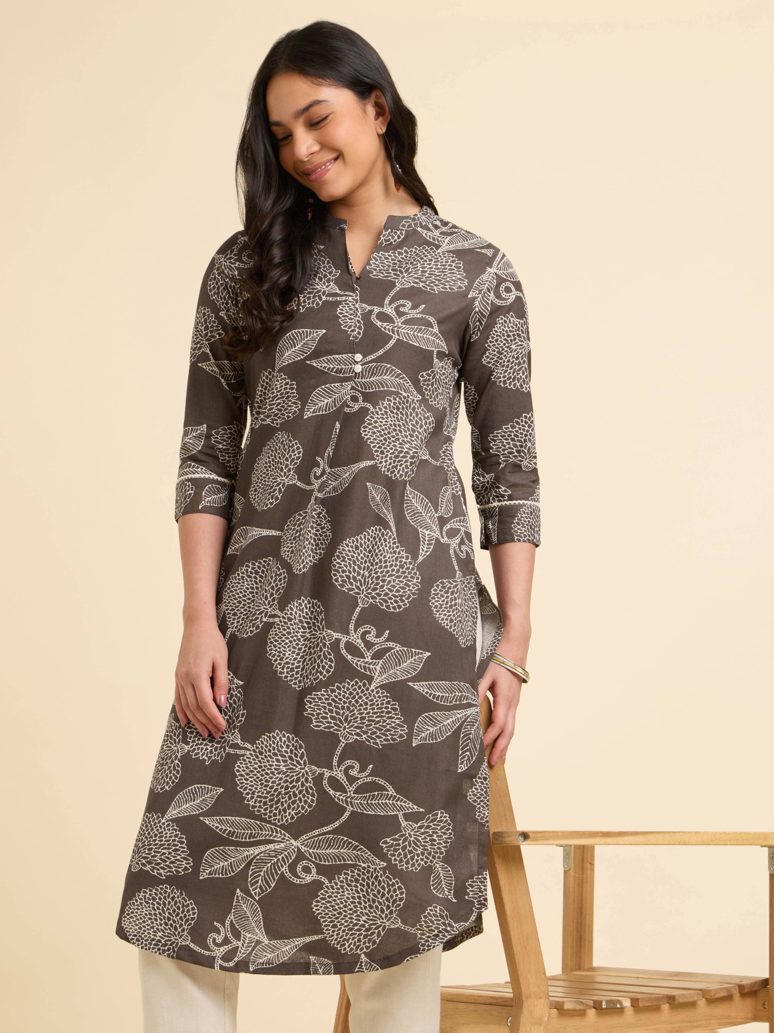 Brown & Ivory Cotton Flax Printed Kurti With Knife Pleats, Curved Hem And Lace Detailing