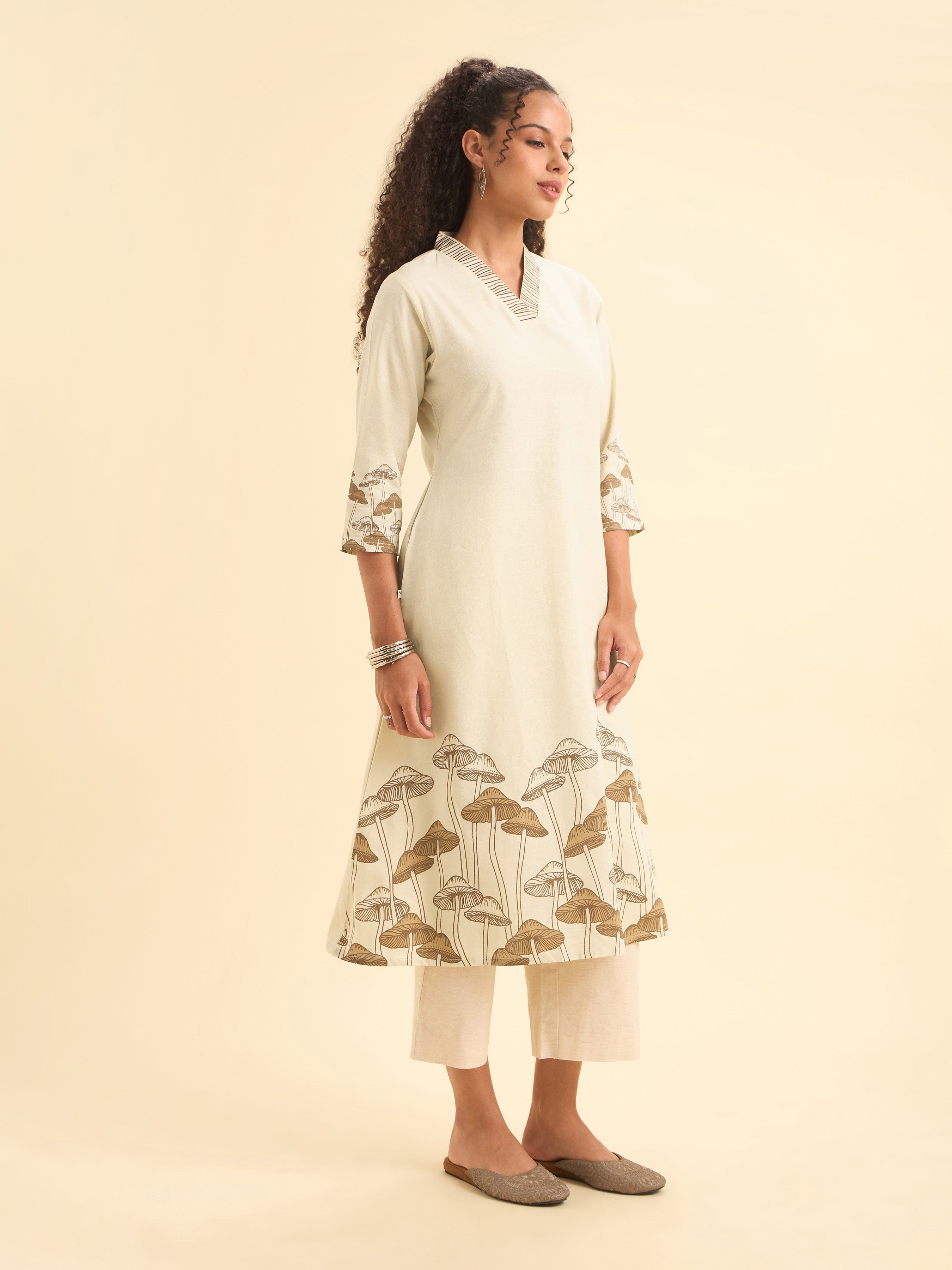 Ivory Cotton Flax Slub Plain Kurti With Placement Prints