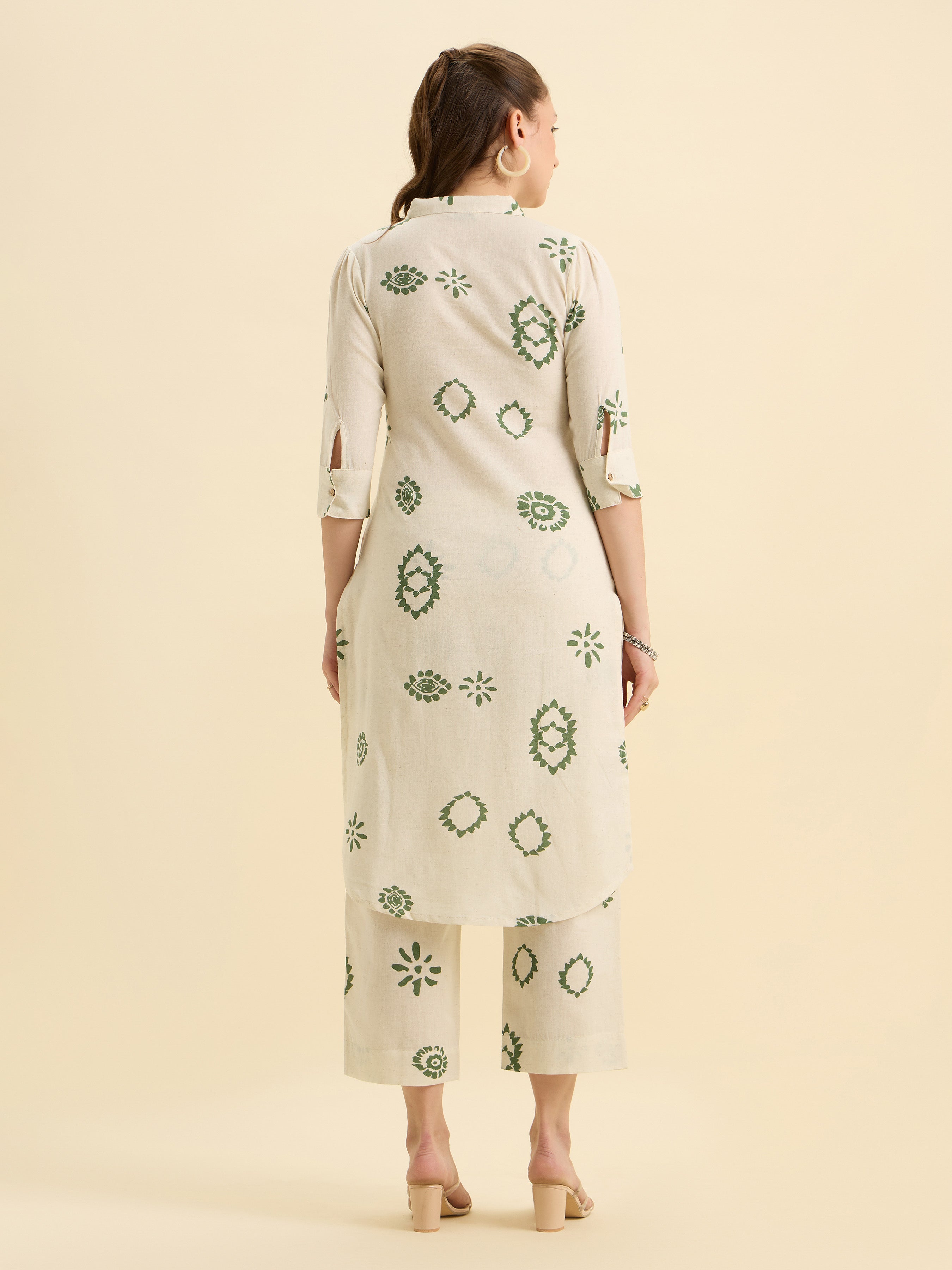 Ivory Green Cotton Flax Printed Slited Kurti Set With Knife Pleats & Curved Hem Line