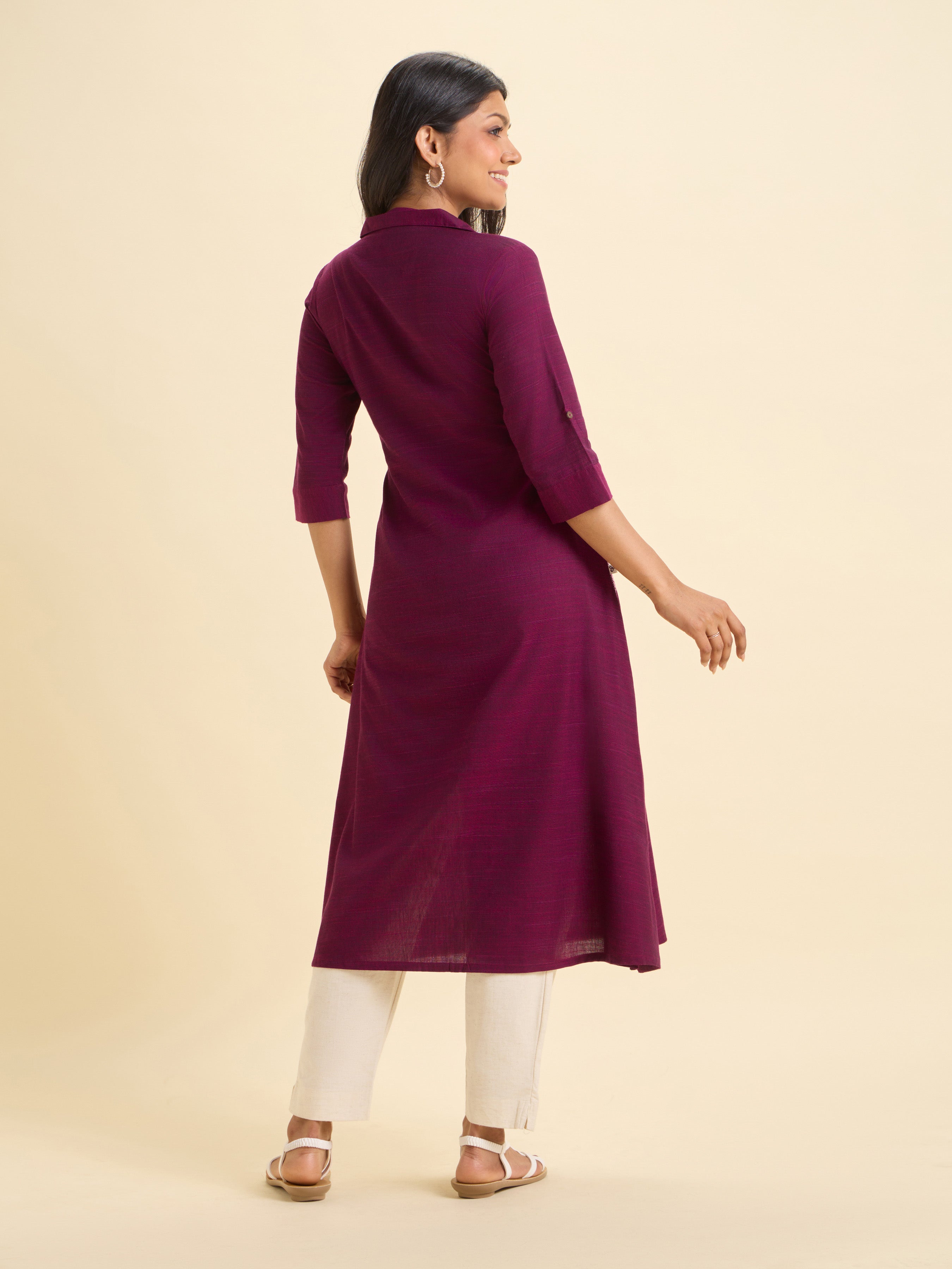 Majenta Cotton Viscose Slub Flared Kurti With Curved Hem And Embroidery
