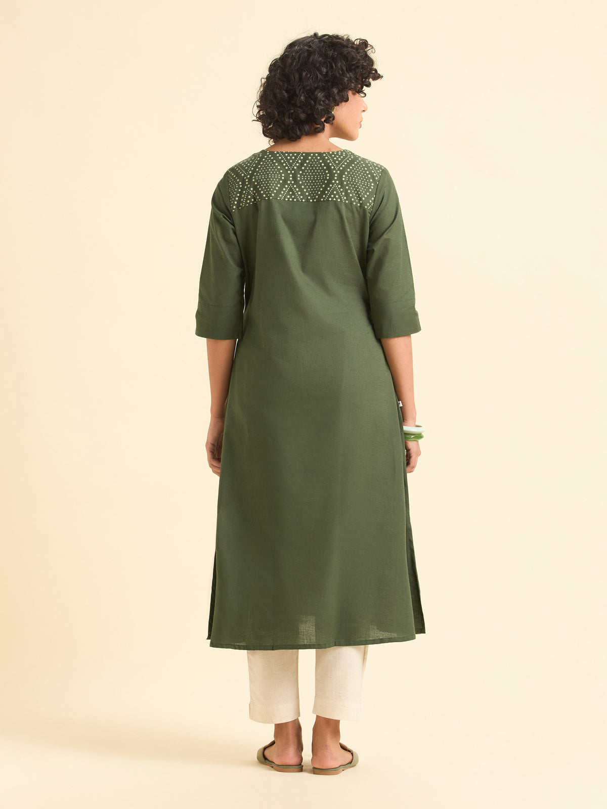 Olive Green Cotton Flared Centre Cut Kurti With Back Yoke And Placement Print