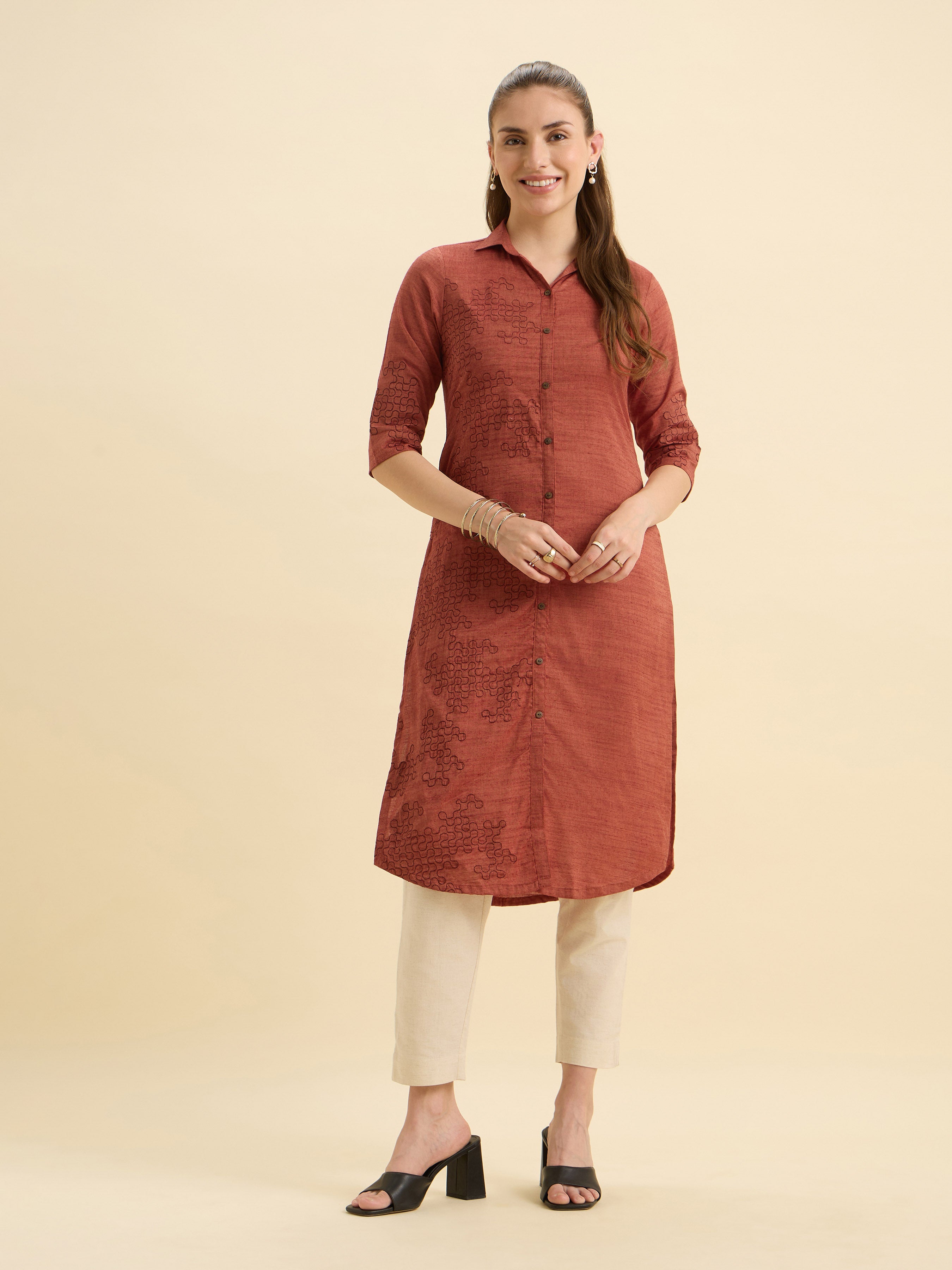 Rust Orange Cotton Viscose Slitted Kurti With Embroidery And Curved Hemline