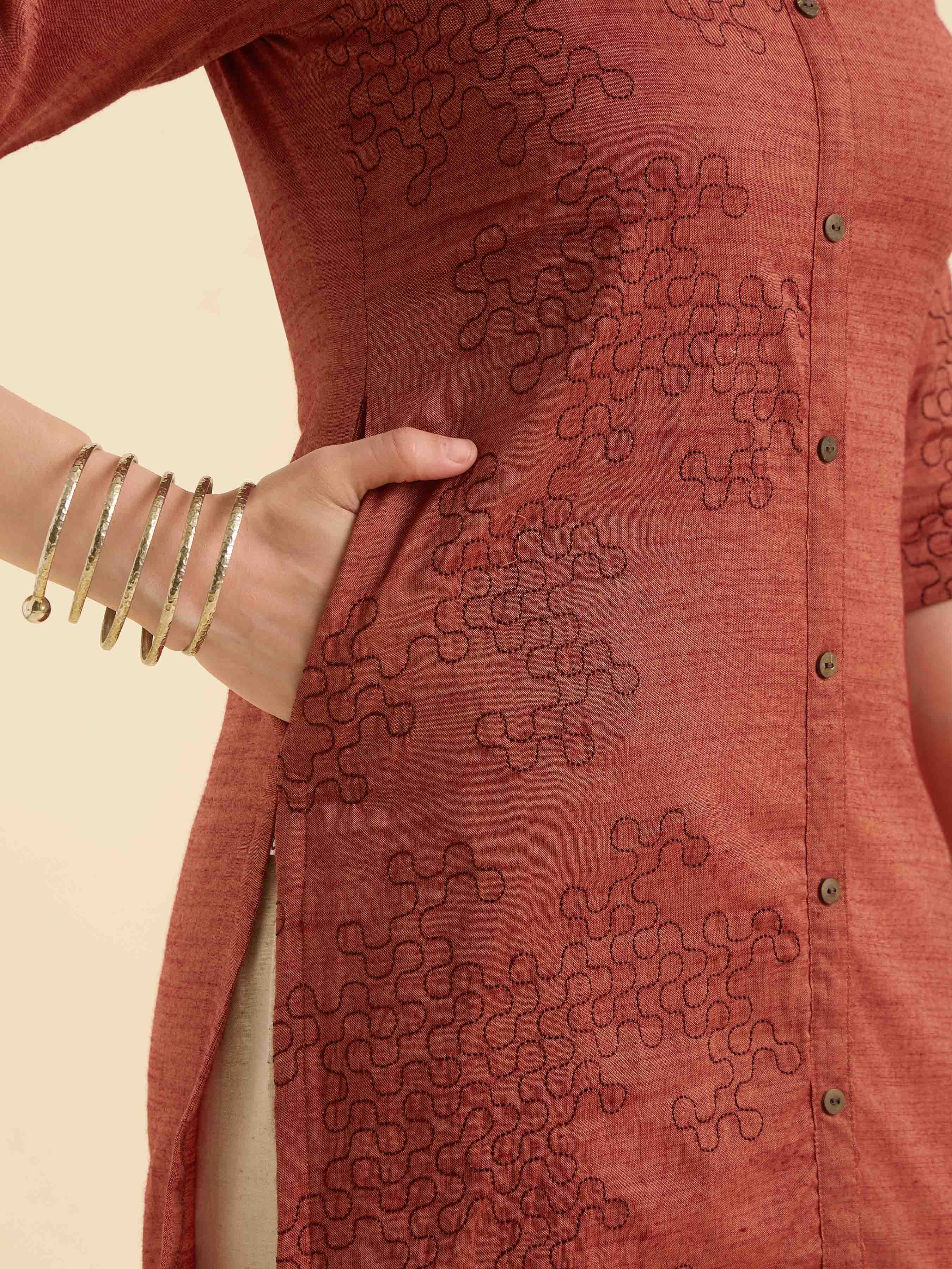 Rust Orange Cotton Viscose Slitted Kurti With Embroidery And Curved Hemline