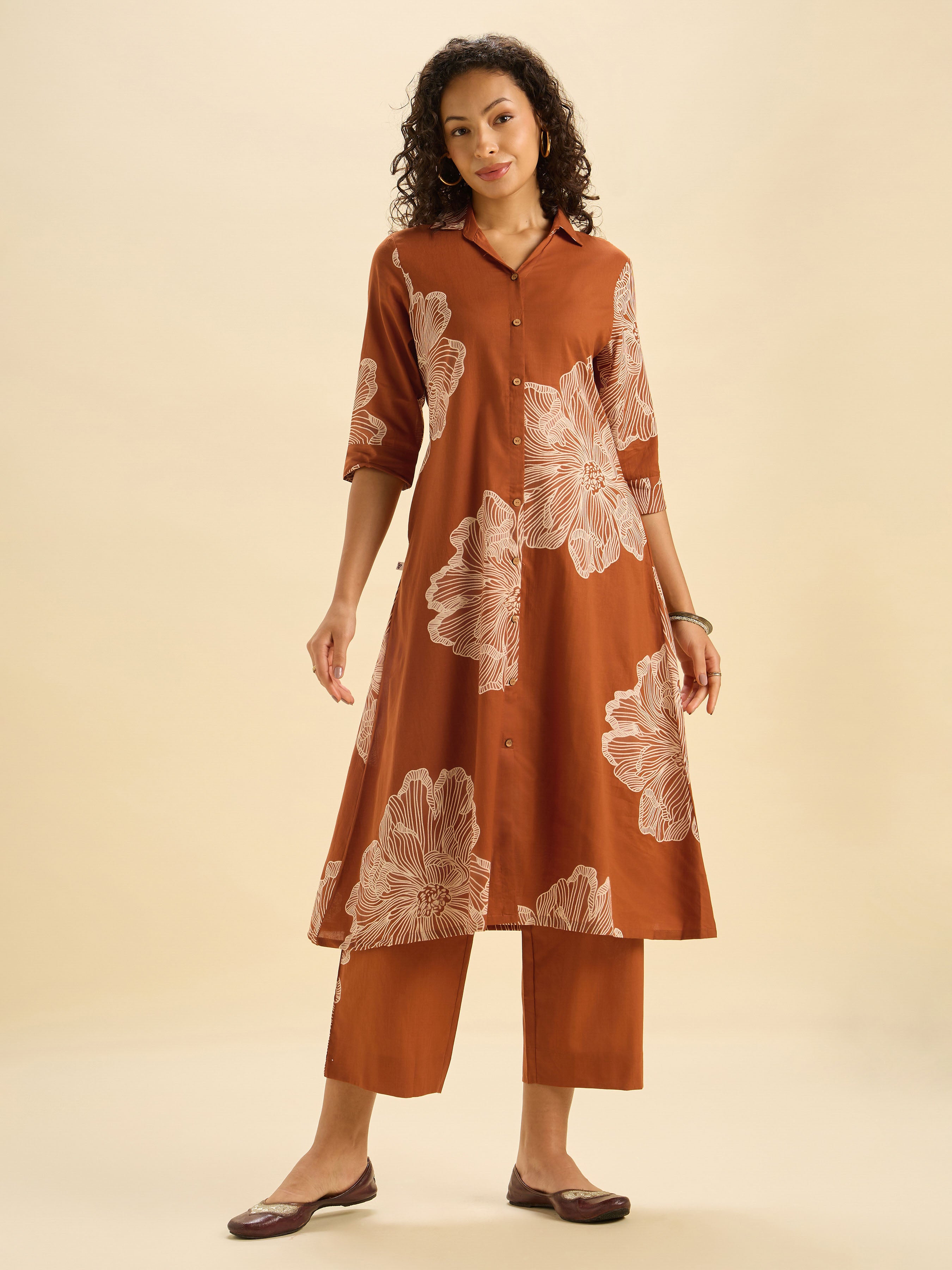 Rust Orange Pure Cotton Printed Flared Kurti Set